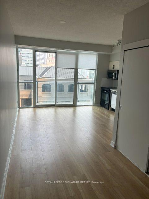 Photo 3 of Unit 1707, 126 Simcoe Street, Toronto, Waterfront Communities — HOMEH