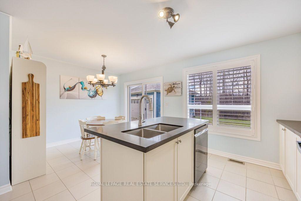 Photo 10 of 74 Robert Street S, Wasaga Beach — HOMEH