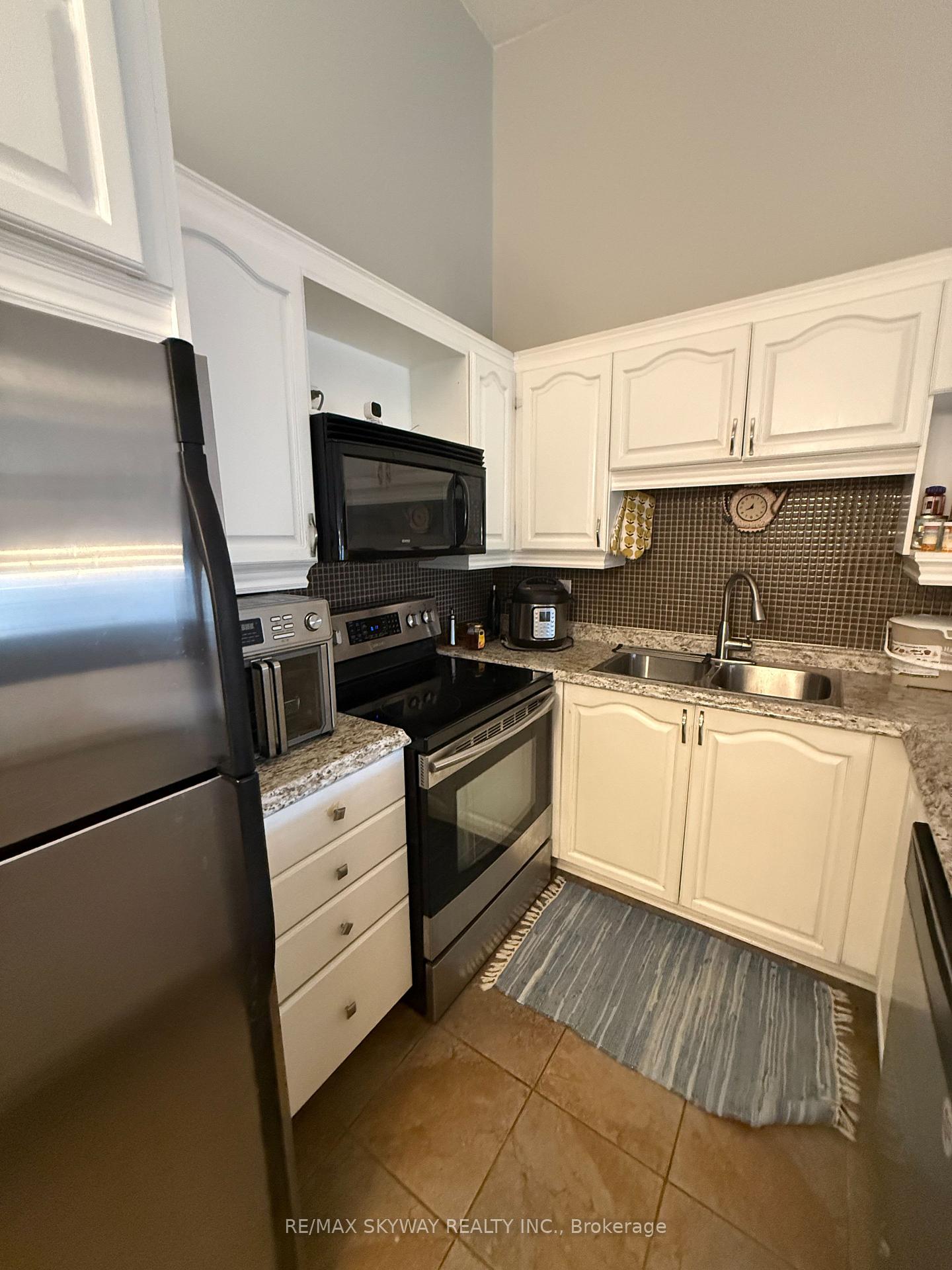 Photo 2 of Unit 410, 4025 Kilmer Drive, Burlington, Tansley — HOMEH