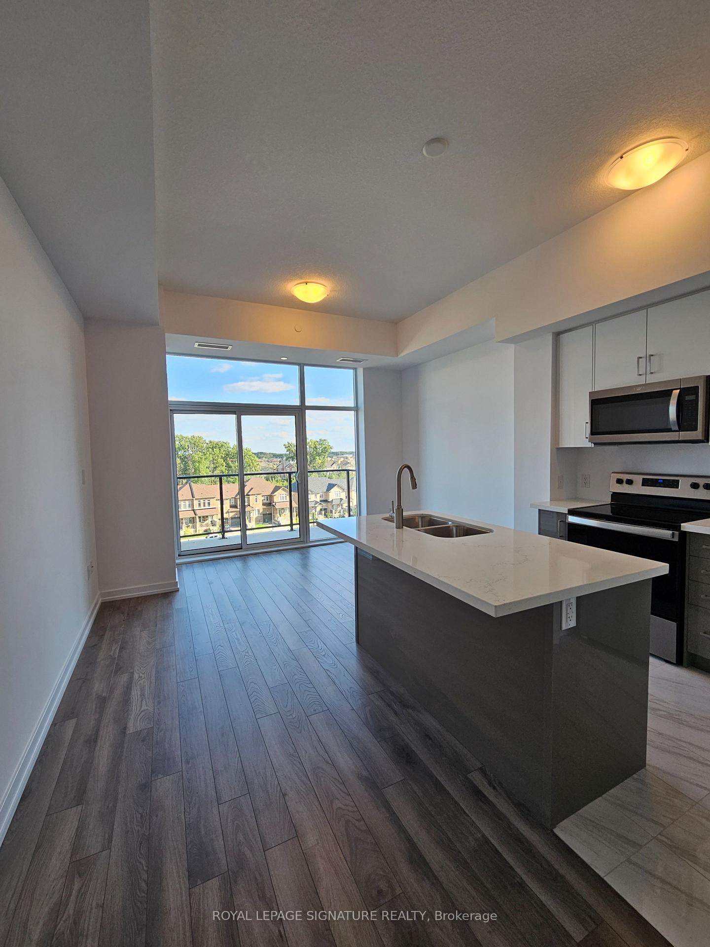 Photo 3 of Unit 512, 460 Dundas Street E, Hamilton, Waterdown — HOMEH