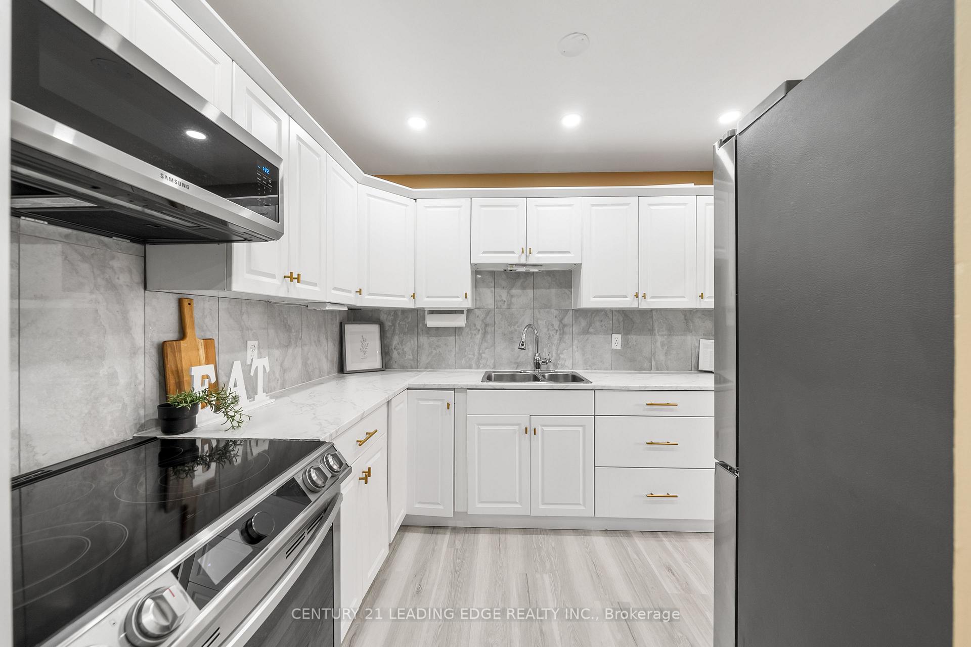 Photo 13 of Unit 502, 131 Taunton Road E, Oshawa, Centennial — HOMEH