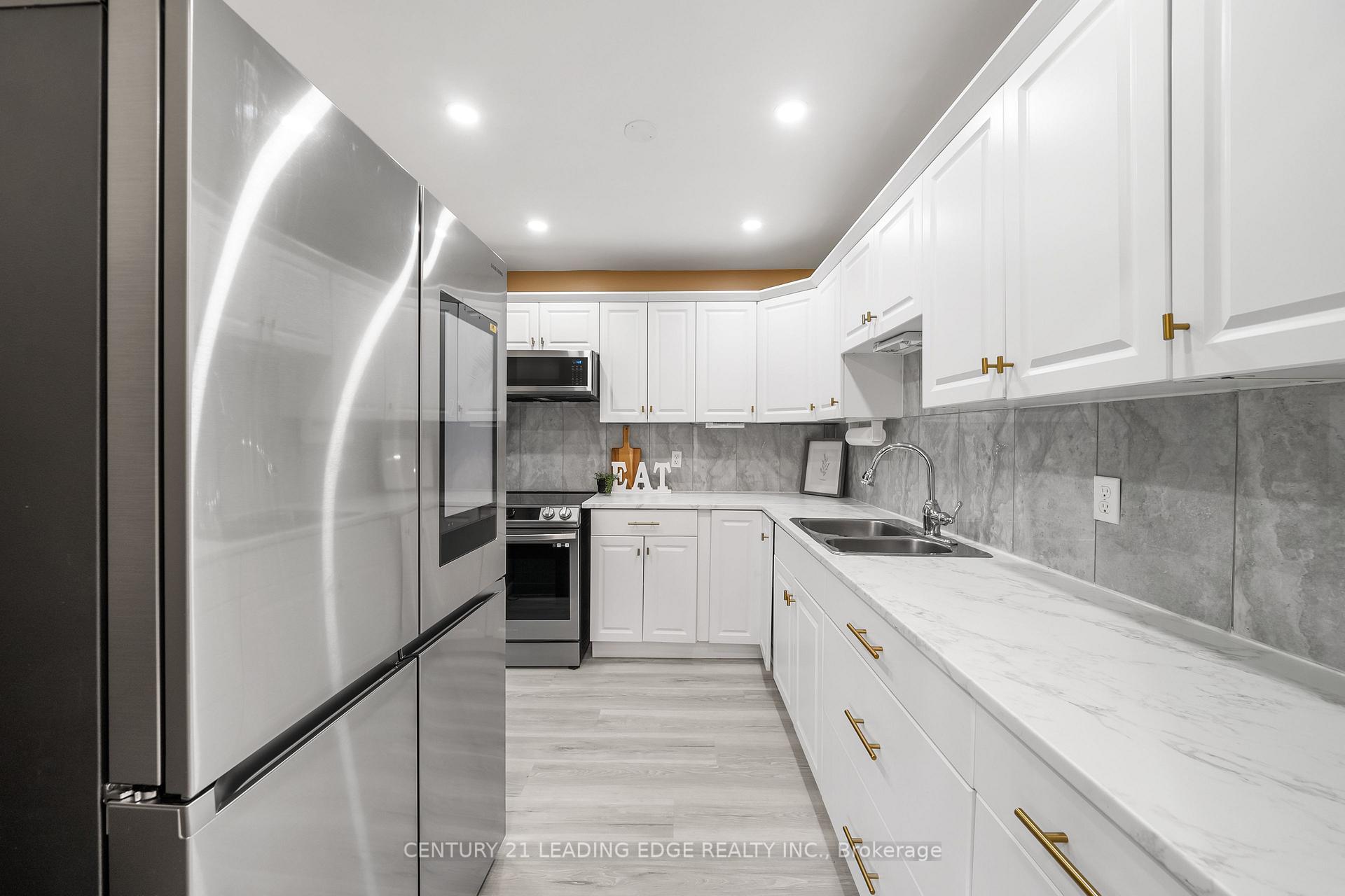 Photo 15 of Unit 502, 131 Taunton Road E, Oshawa, Centennial — HOMEH