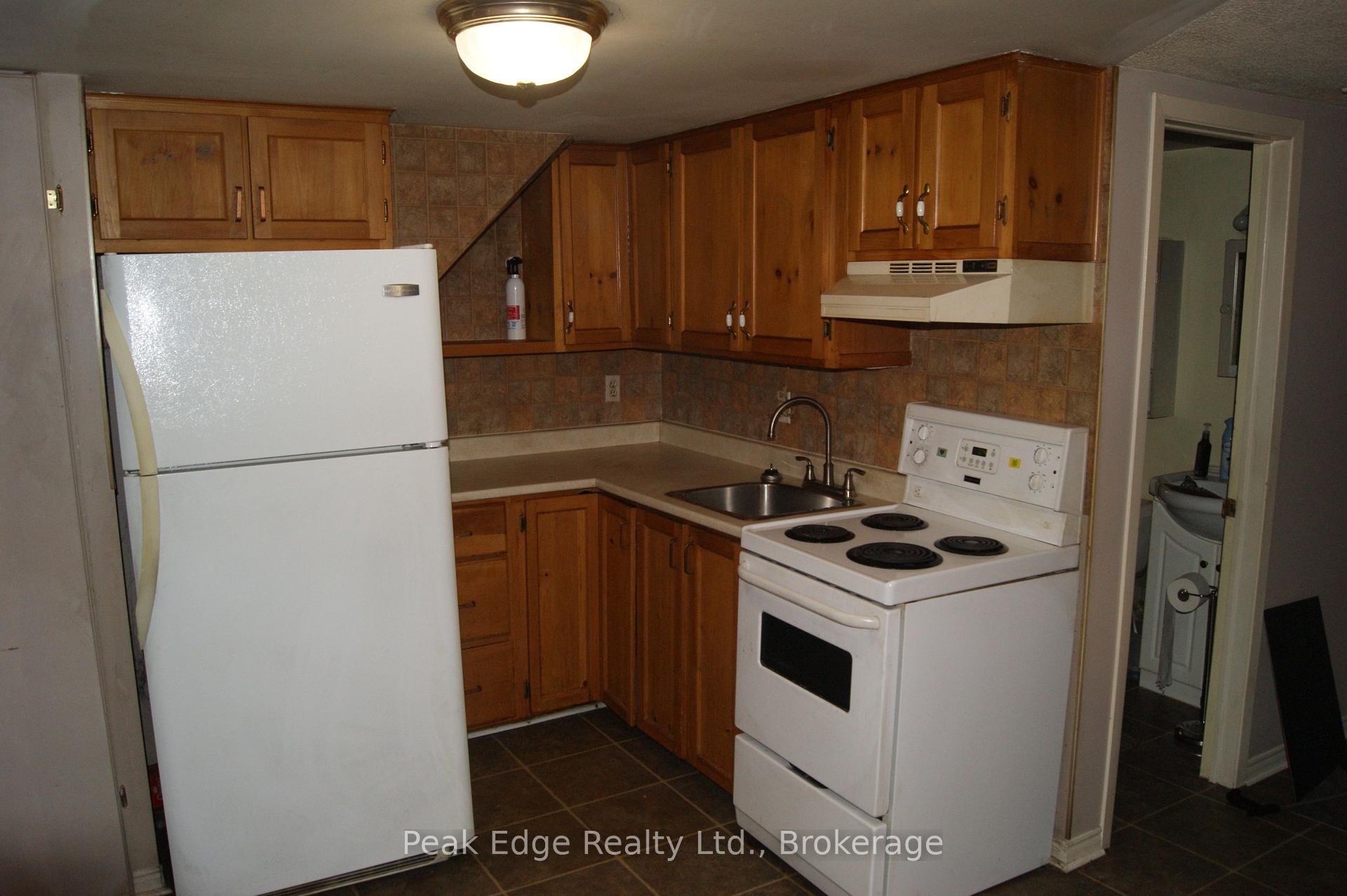 Photo 5 of 338 Colborne Street W, Orillia — HOMEH