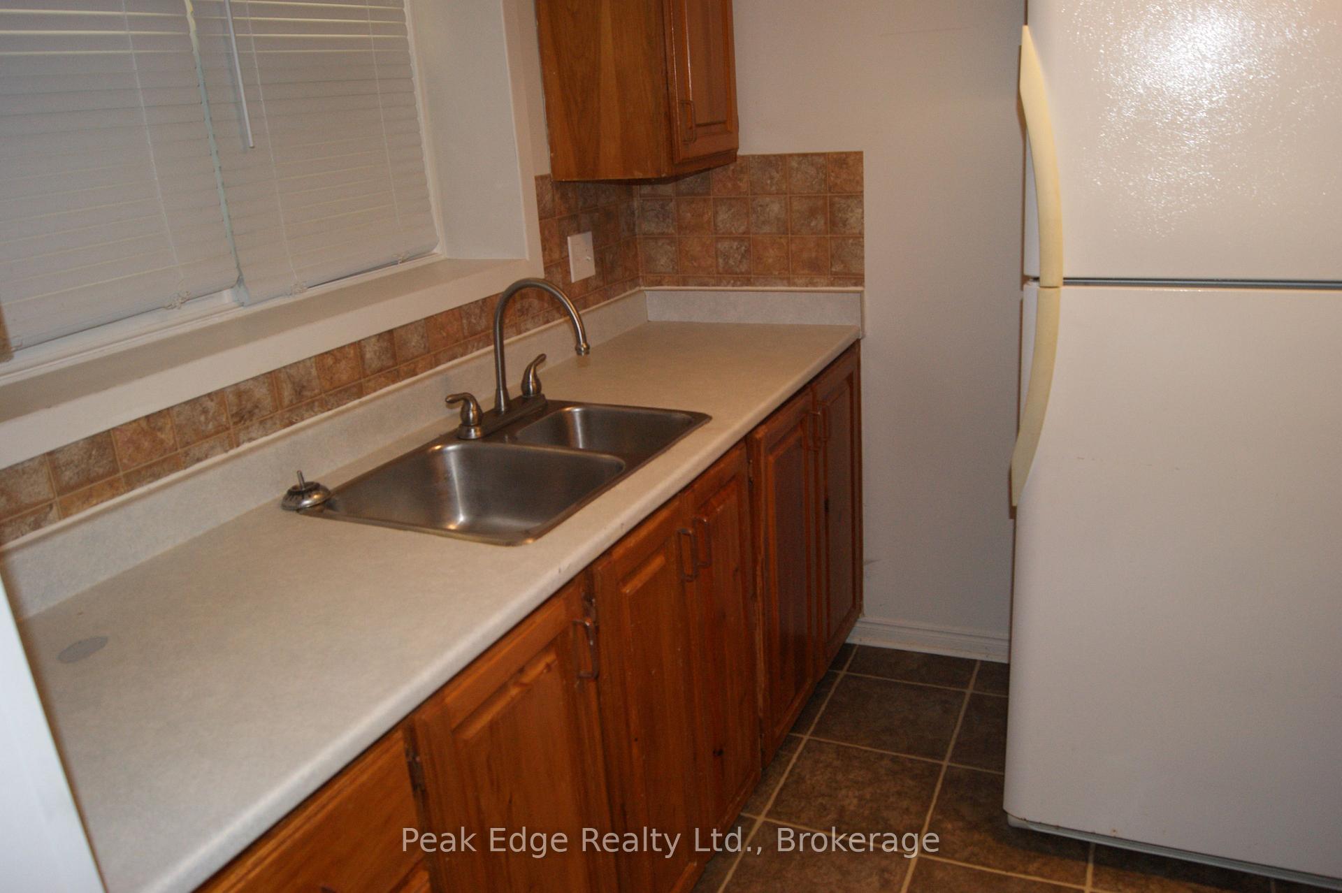 Photo 1 of 338 Colborne Street W, Orillia — HOMEH