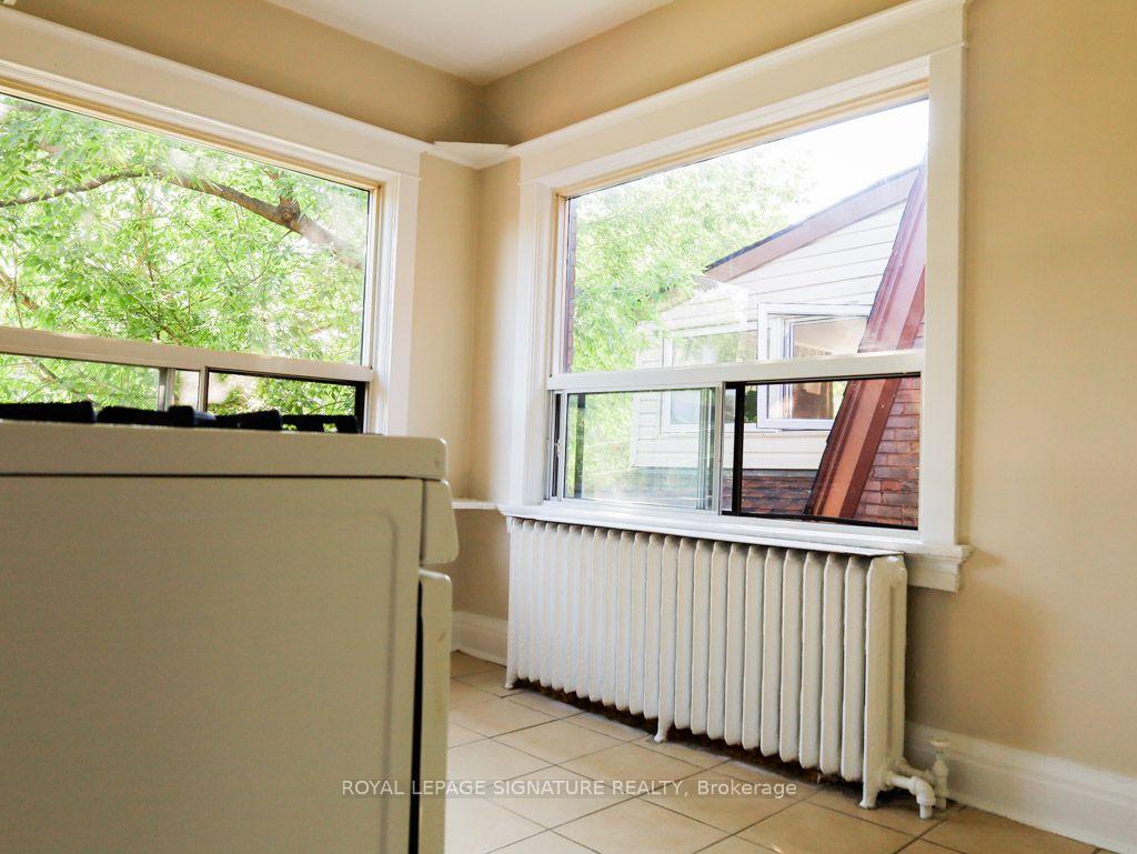 Photo 5 of Unit All Inclusive Upper, 111 Northcliffe Boulevard, Toronto, Oakwood Village — HOMEH