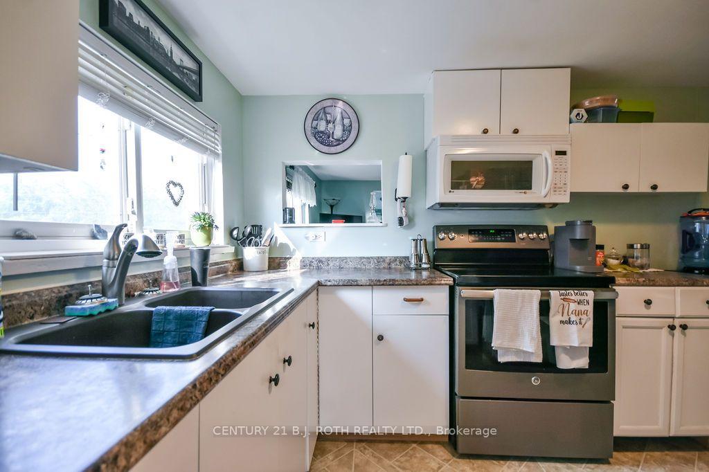 Photo 10 of 412 Couchiching Point Road, Orillia — HOMEH
