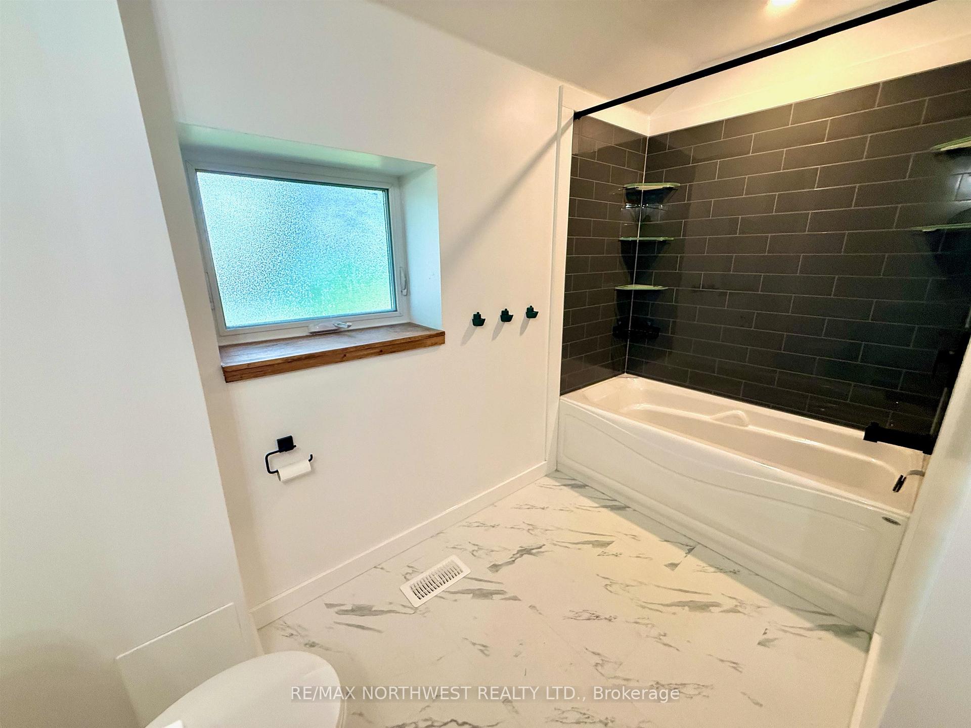 Photo 19 of 715 St Clair, Kenora, Keewatin — HOMEH