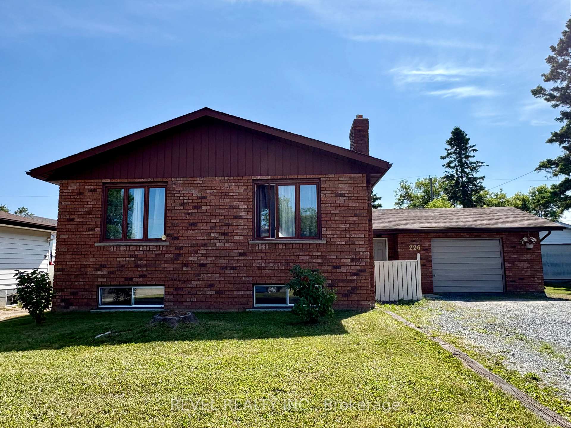 Photo 2 of 226 Second Avenue, Cochrane — HOMEH