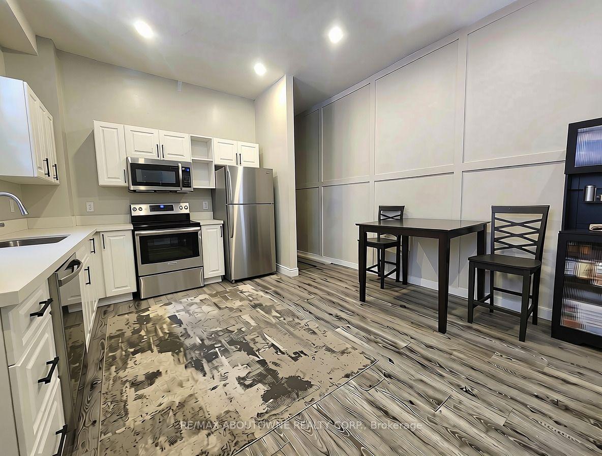 Photo 5 of Unit 1B, 498 Main Street E, Hamilton, Stinson — HOMEH