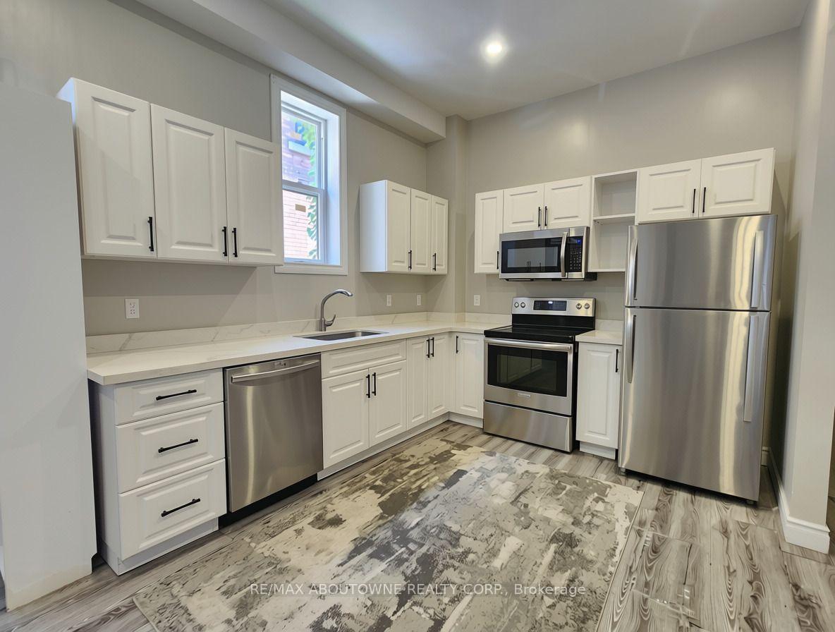 Photo 6 of Unit 1B, 498 Main Street E, Hamilton, Stinson — HOMEH