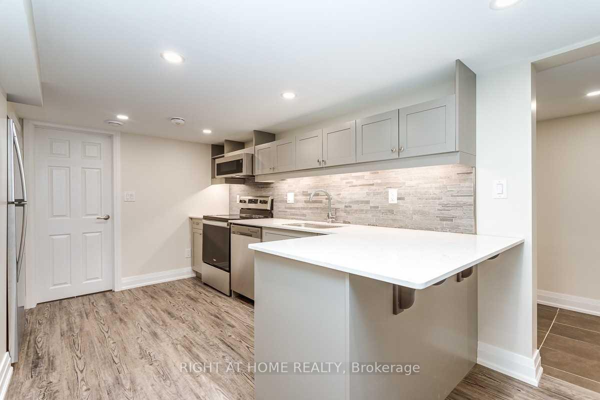 Photo 5 of Unit Unit C, 691 Simcoe Street, Oshawa, Centennial — HOMEH