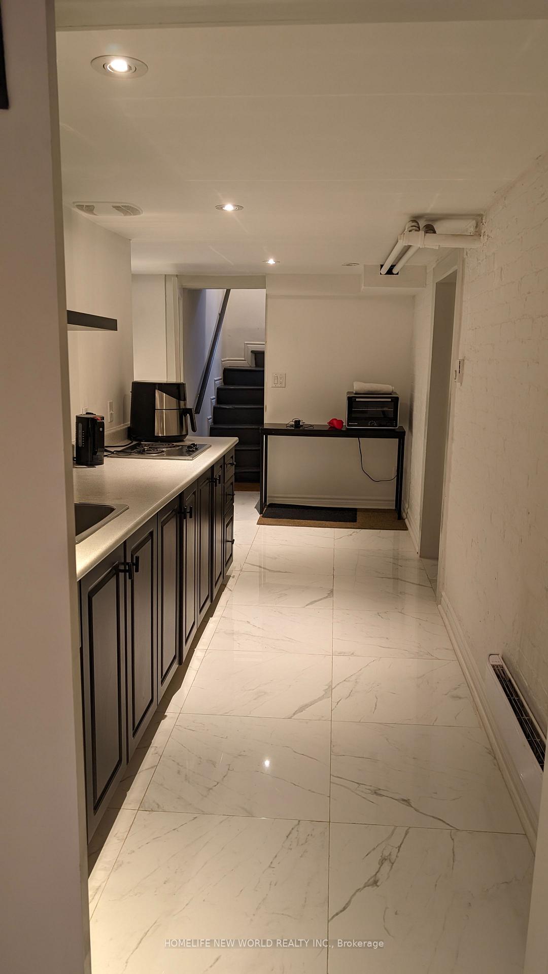 Photo 5 of Unit Lower, 16 Laxton Avenue, Toronto, South Parkdale — HOMEH