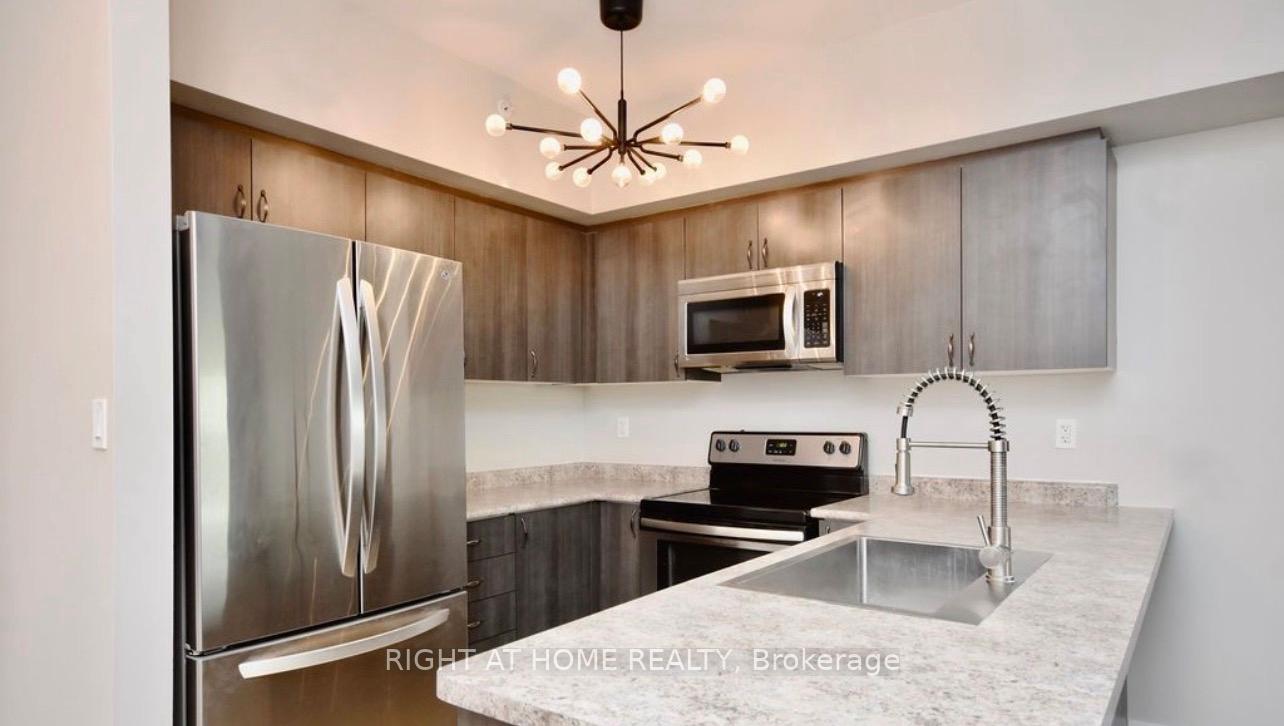 Photo 11 of Unit 405, 299 Cundles Road E, Barrie, Alliance — HOMEH