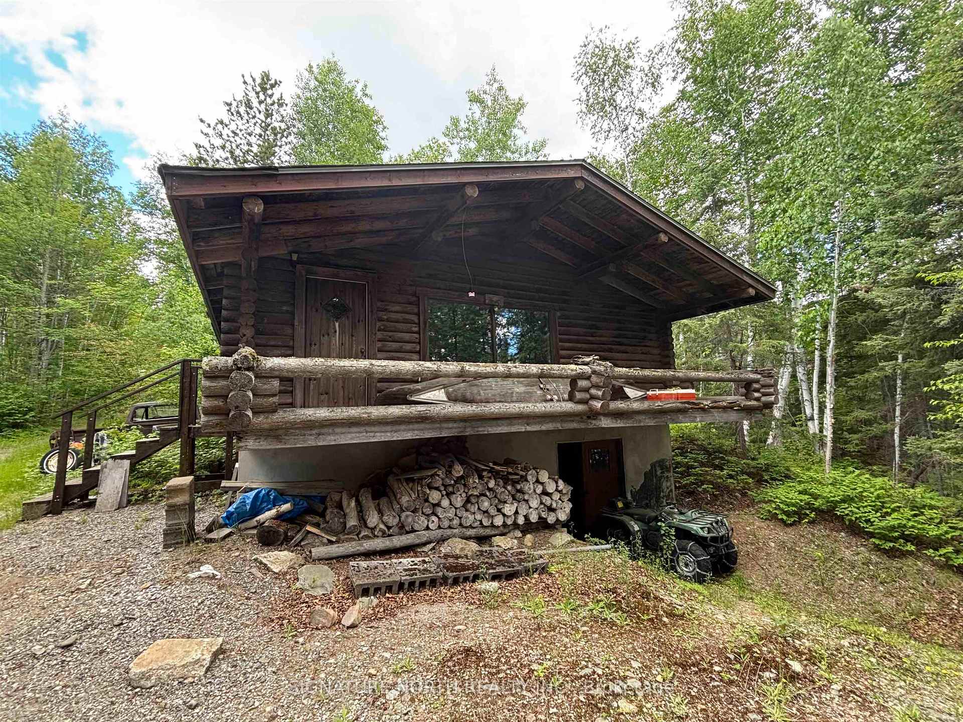 Front of LOT 4 (Fire#42) Eva Lake West Rd.