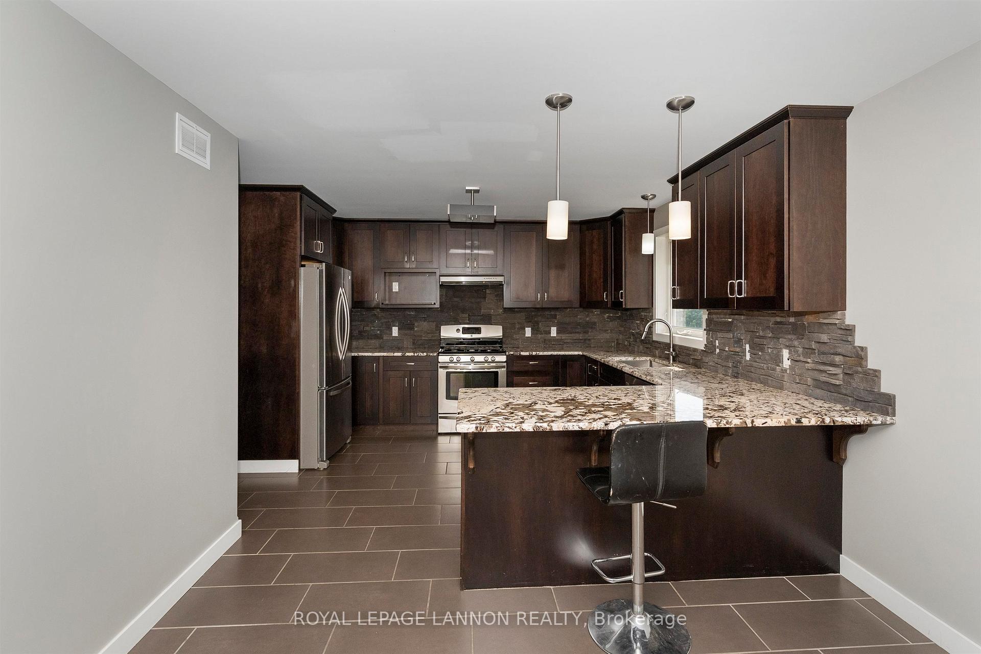Photo 10 of 461 Longbow Street, Thunder Bay, John Street North — HOMEH