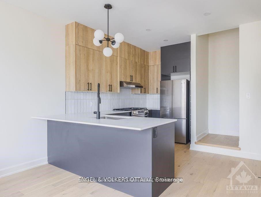 Photo 3 of Unit A, 136 Carillon Street, Ottawa, Vanier — HOMEH