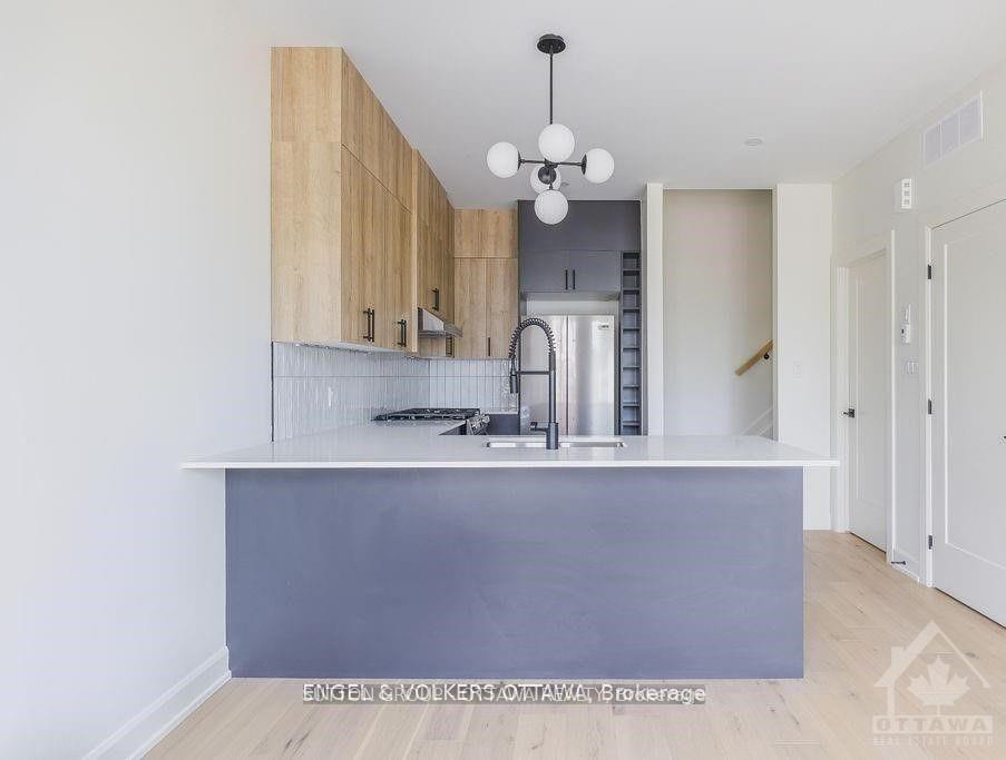 Photo 4 of Unit A, 136 Carillon Street, Ottawa, Vanier — HOMEH