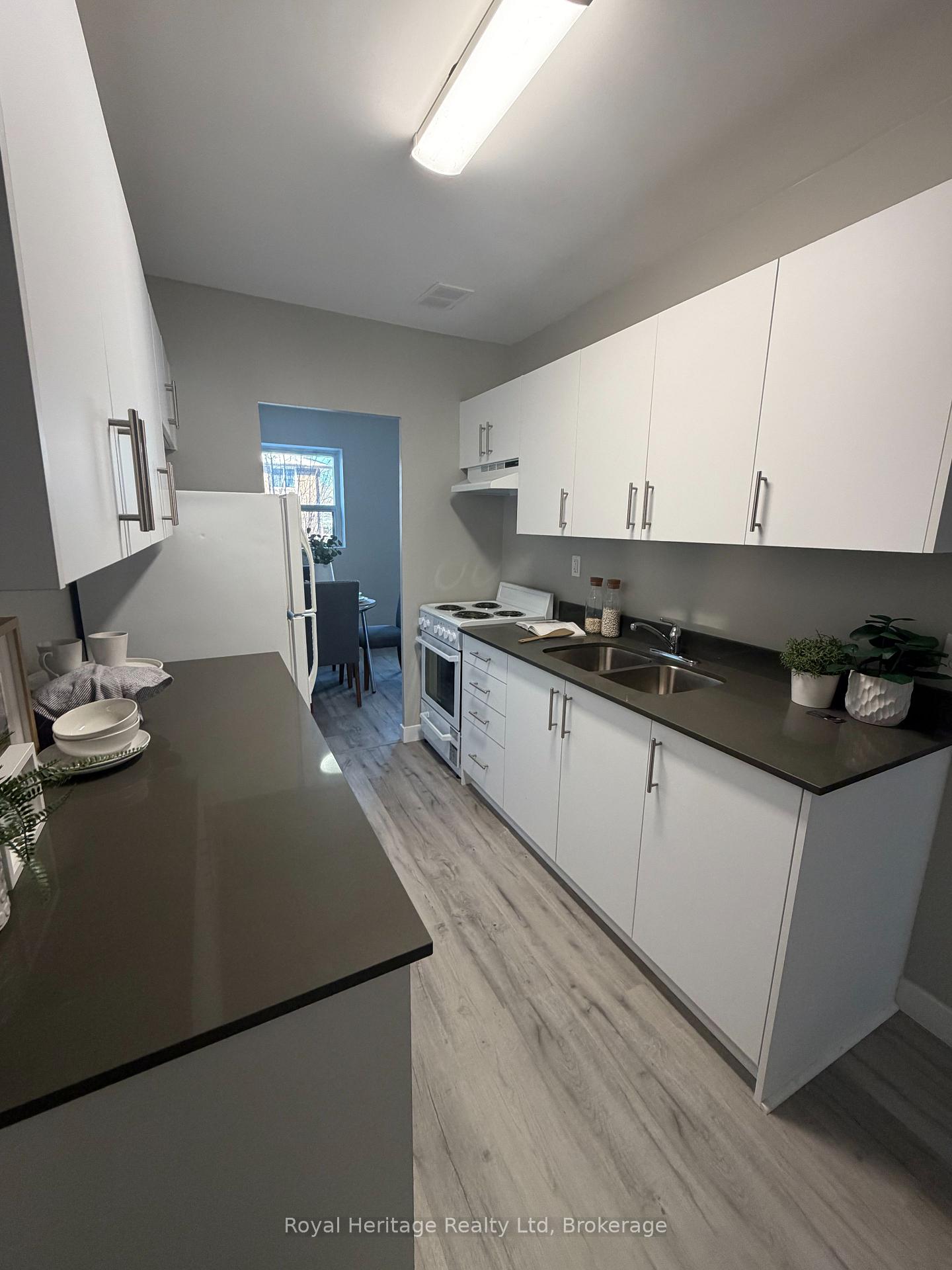 Photo 7 of Unit 309, 330 Gibb Street, Oshawa, Vanier — HOMEH