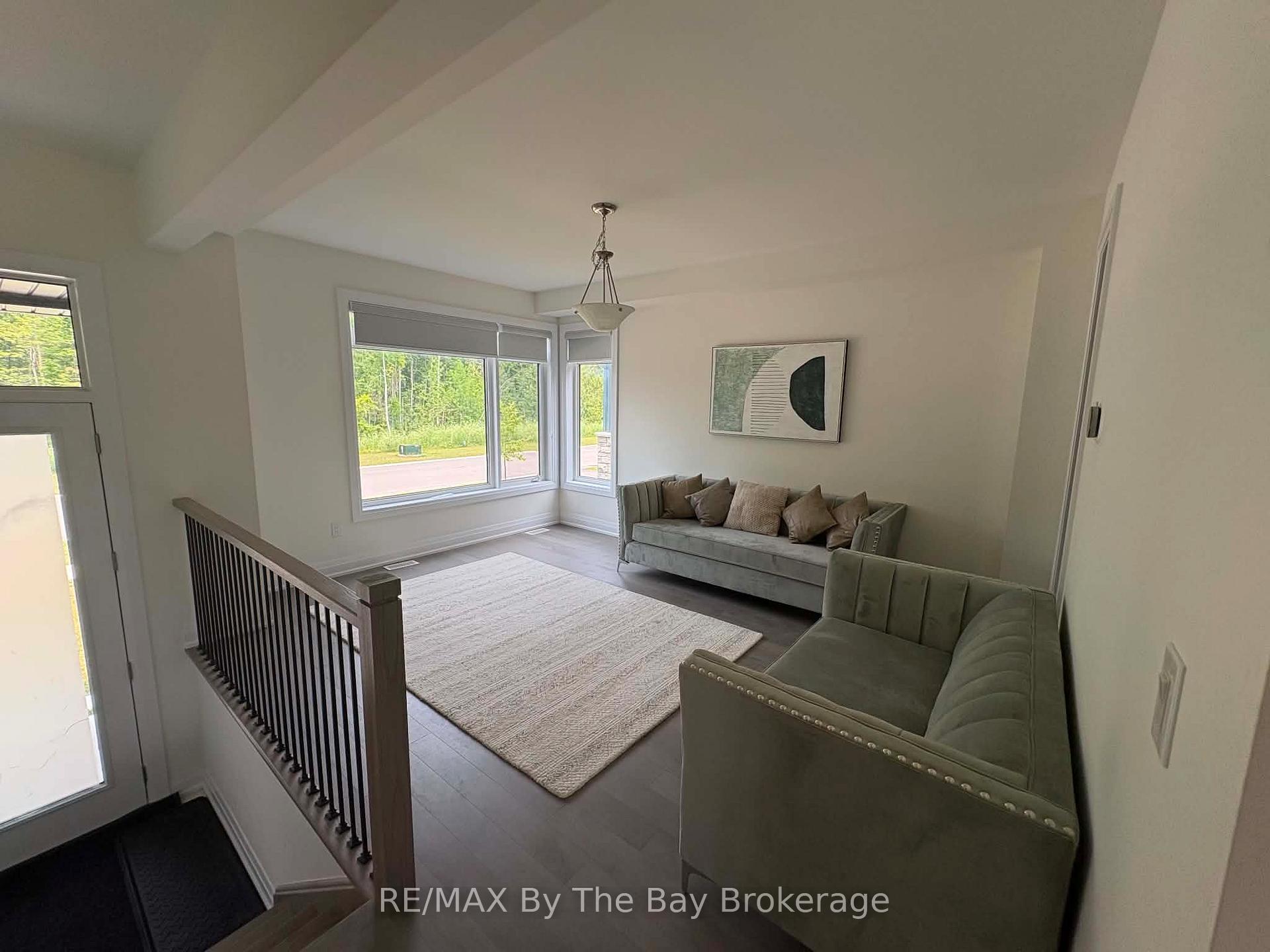 Photo 3 of Unit Upper Unit, 218 Mapleside Drive, Wasaga Beach — HOMEH