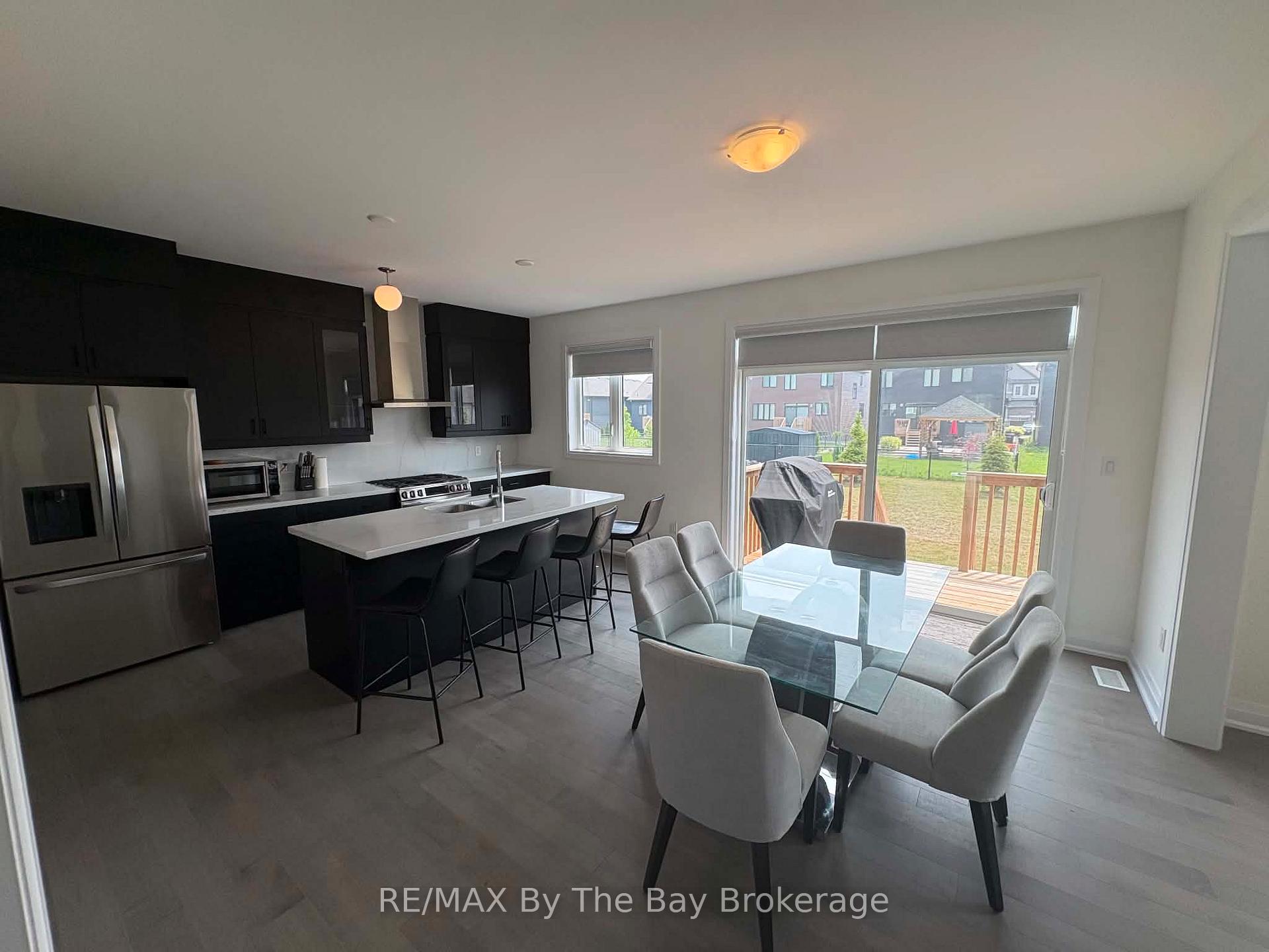 Photo 5 of Unit Upper Unit, 218 Mapleside Drive, Wasaga Beach — HOMEH
