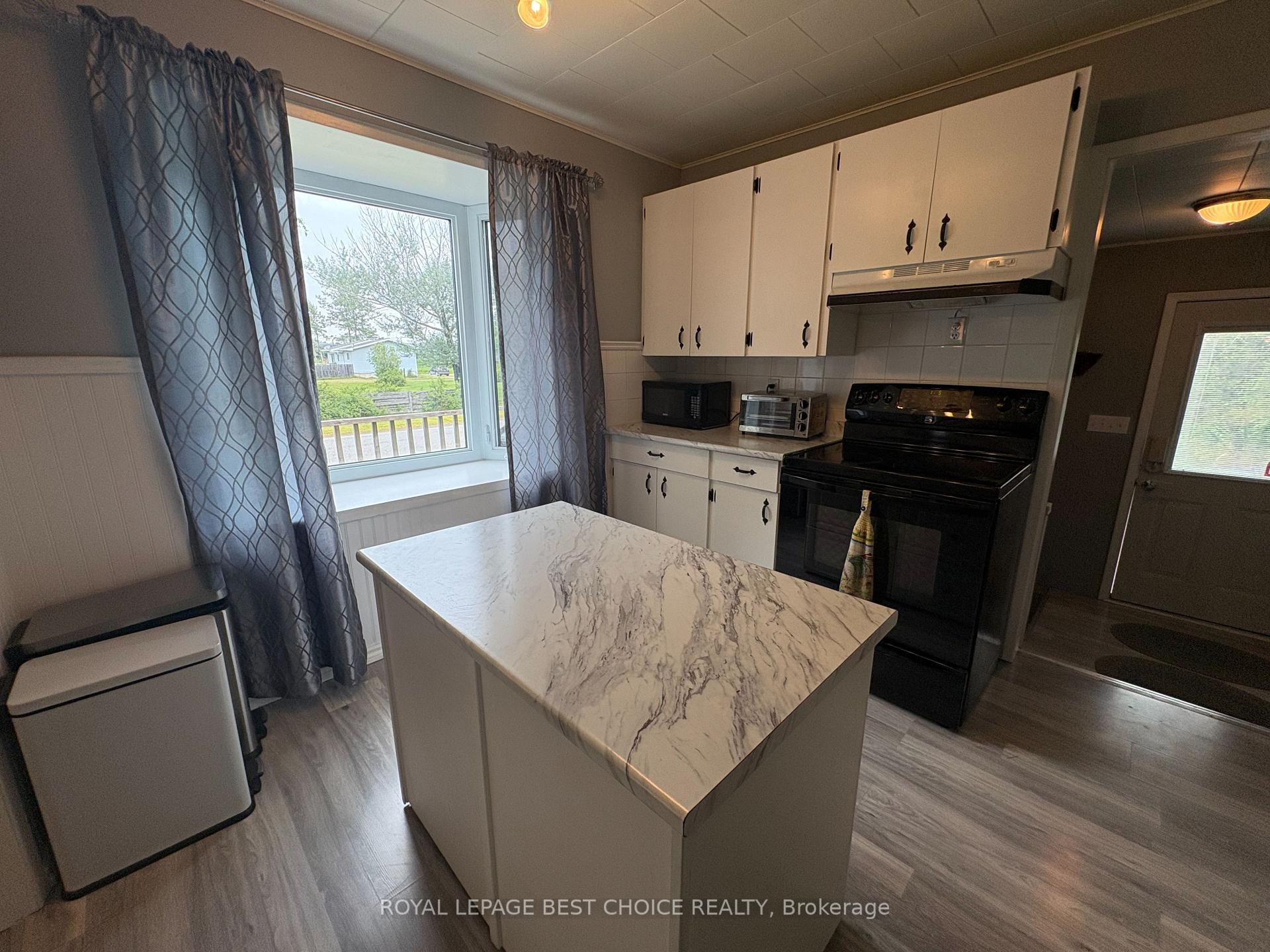 Photo 20 of 106 King Street W, Englehart — HOMEH