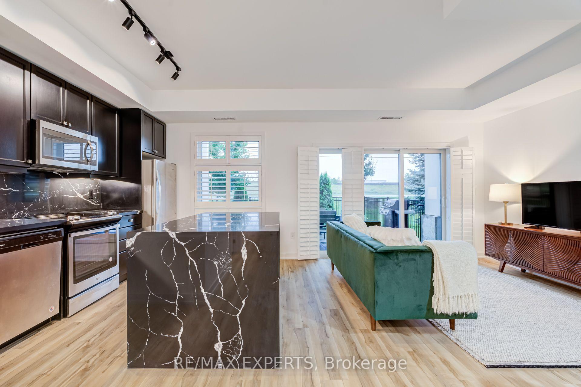 Photo 10 of Unit 121, 555 William Graham Drive, Aurora, Rural Aurora — HOMEH