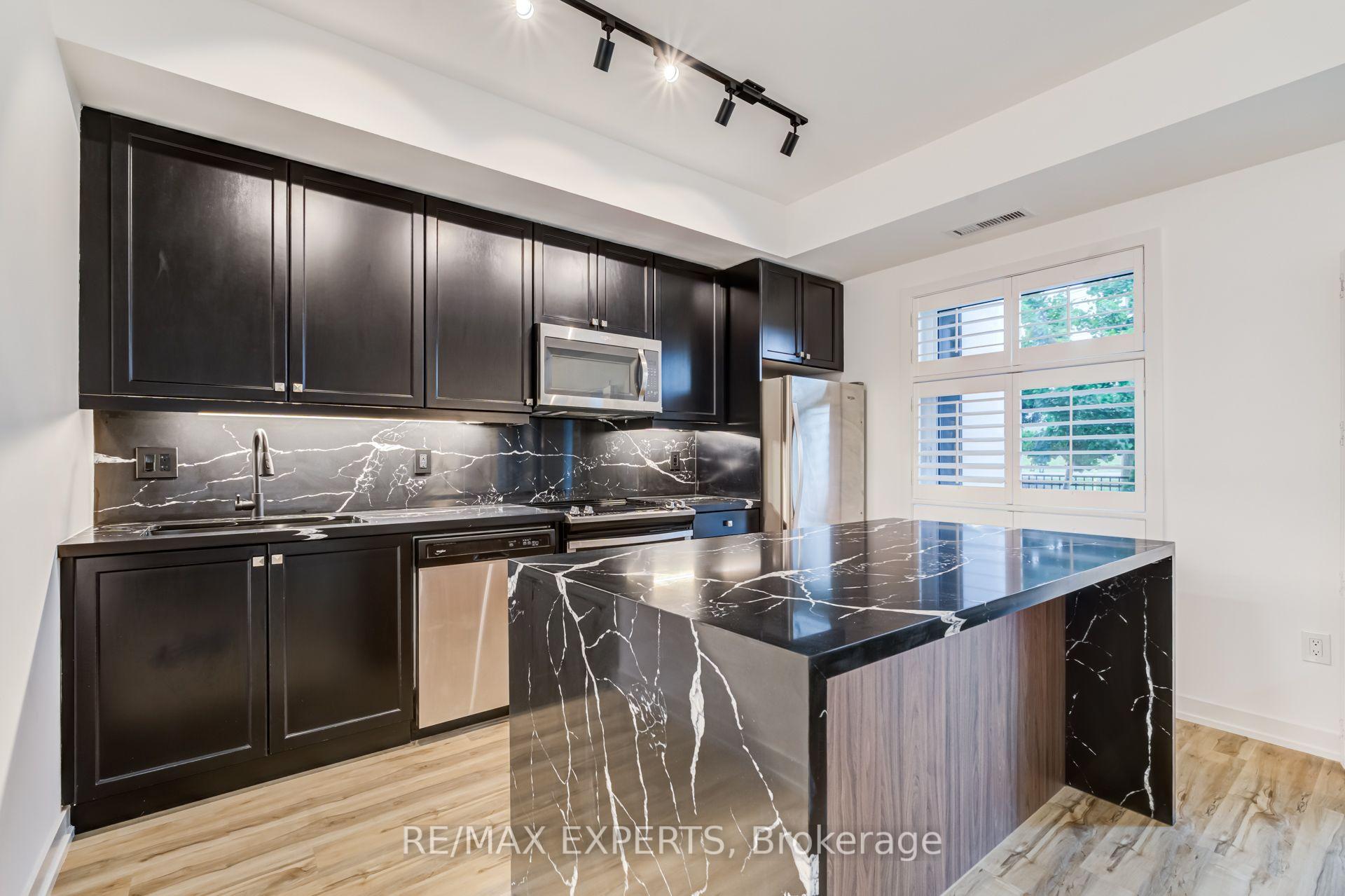 Photo 11 of Unit 121, 555 William Graham Drive, Aurora, Rural Aurora — HOMEH