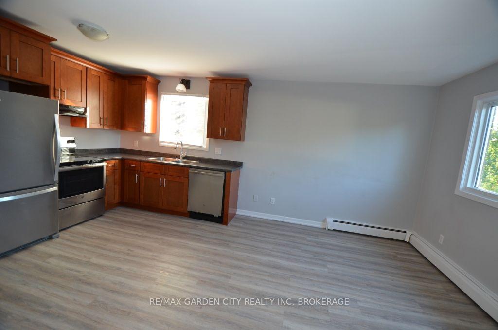 Photo 13 of 25 Ottawa Street, St. Catharines, Downtown — HOMEH