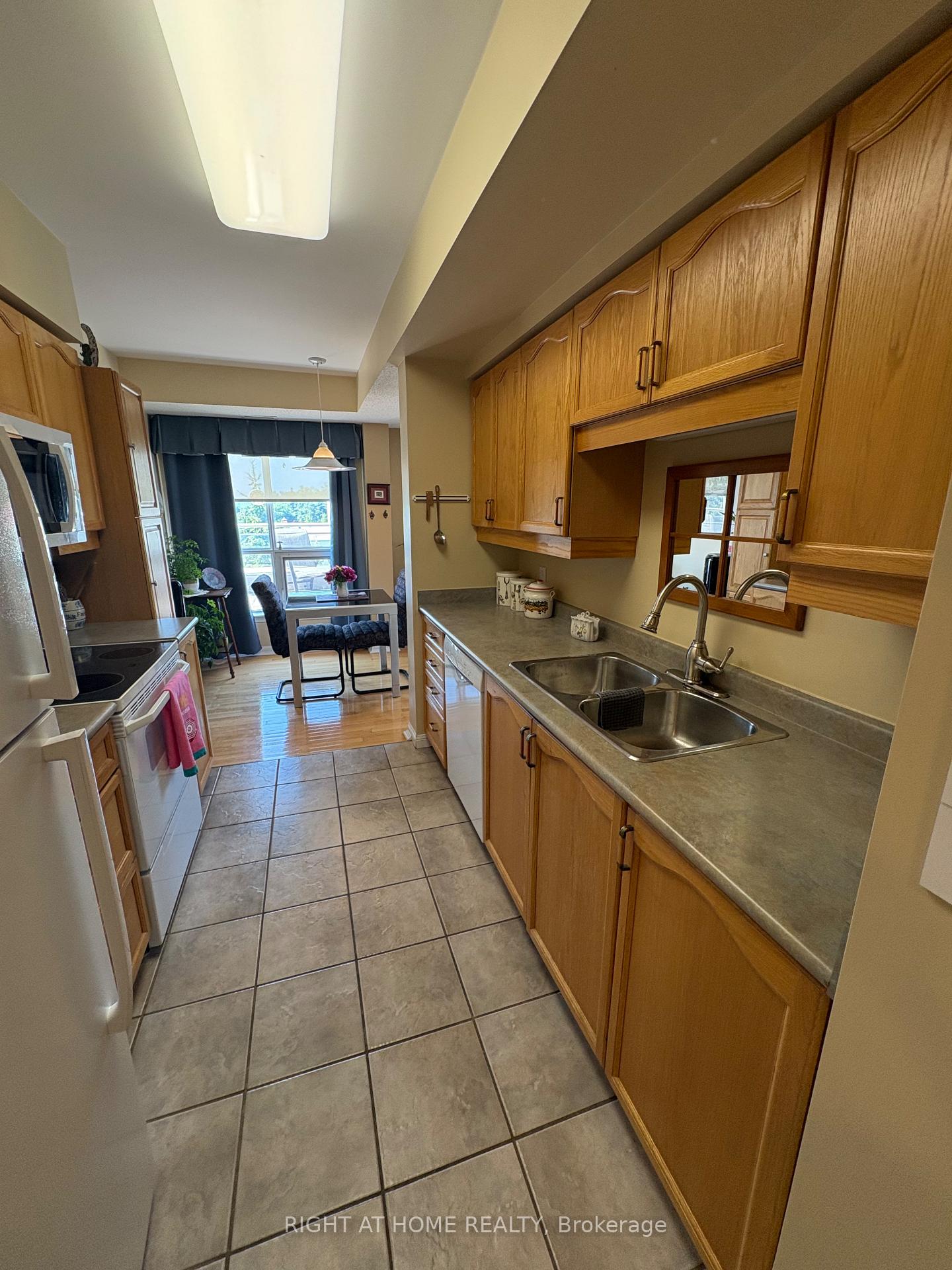 Photo 32 of Unit 404, 94 Dean Avenue, Barrie, Painswick South — HOMEH