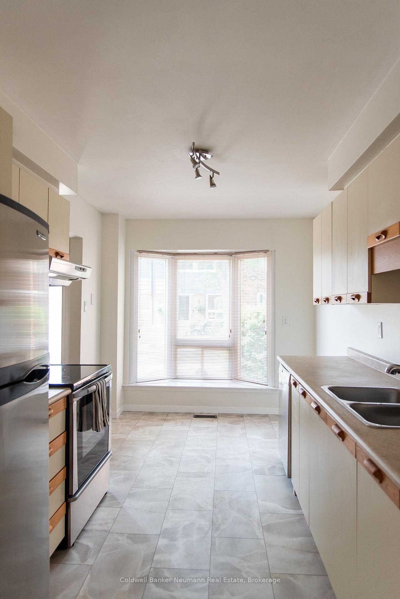Photo 5 of Unit 29, 121 Bagot Street, Guelph, Junction/Onward Willow — HOMEH