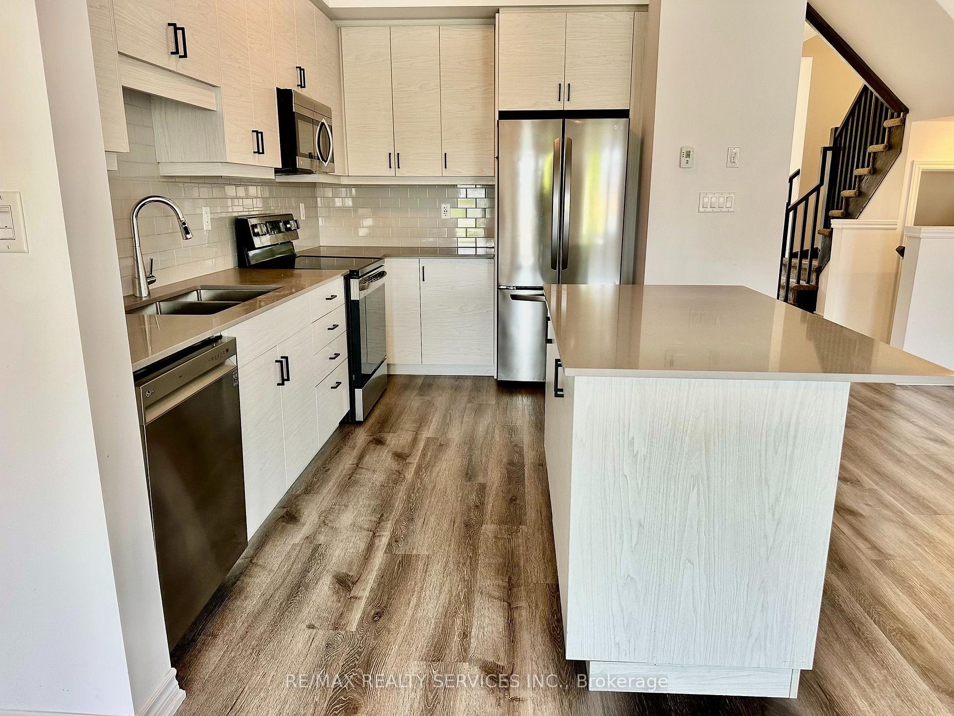 Photo 12 of Unit 22, 461 Blackburn Drive, Brantford, Empire South — HOMEH