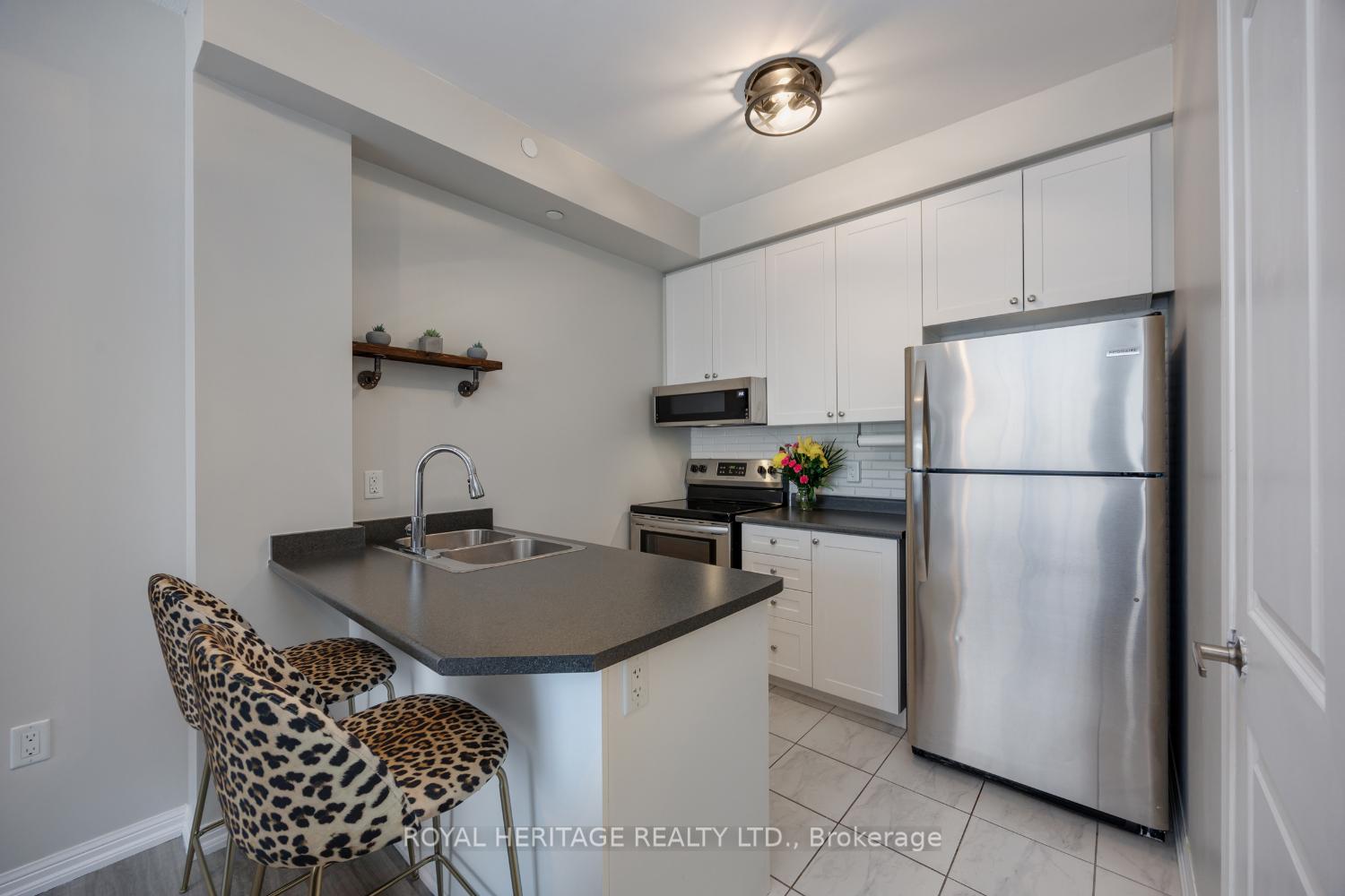 Photo 6 of Unit 220, 80 Aspen Springs Drive, Clarington, Bowmanville — HOMEH