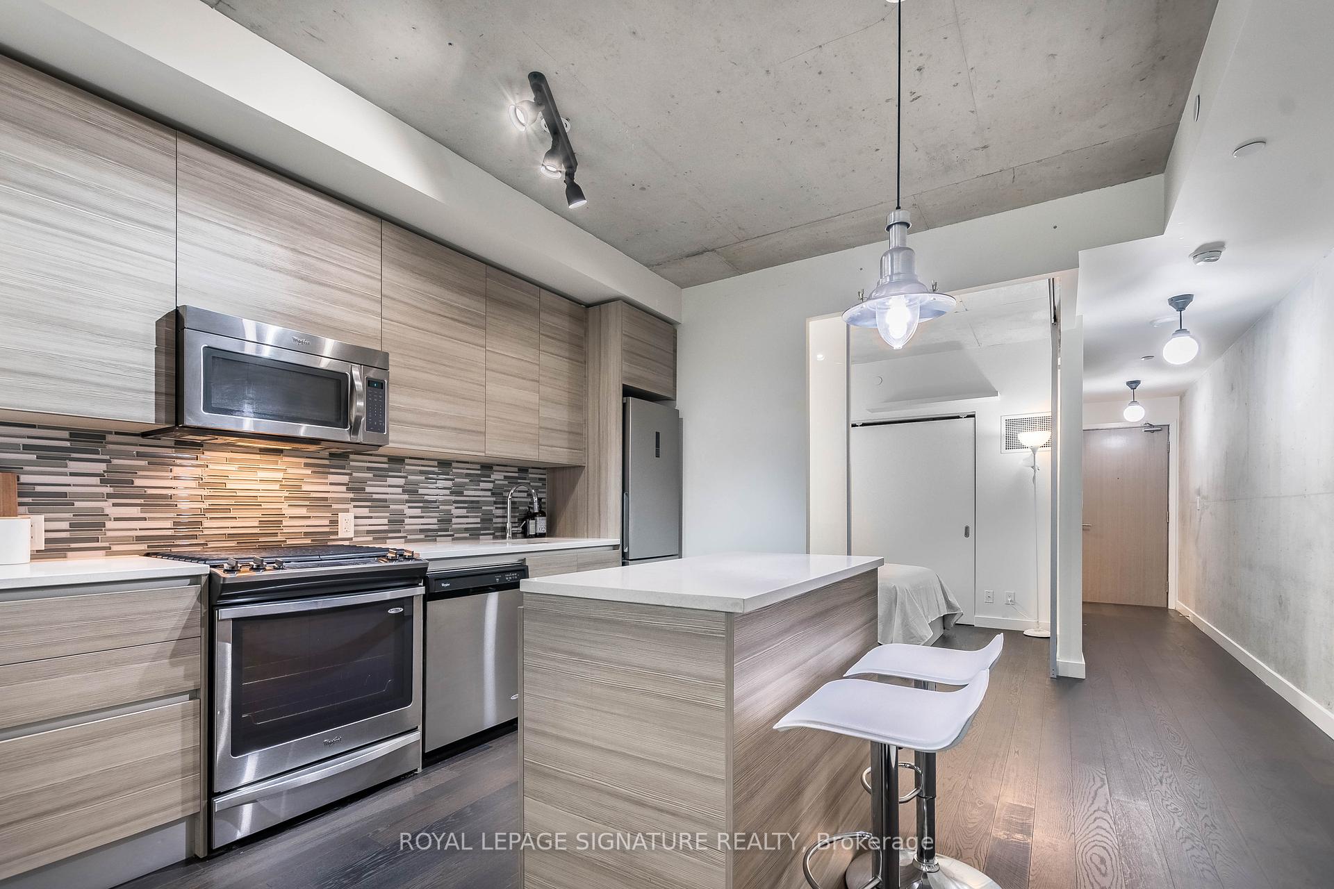 Photo 9 of Unit 318, 111 Bathurst Street, Toronto, Waterfront Communities — HOMEH