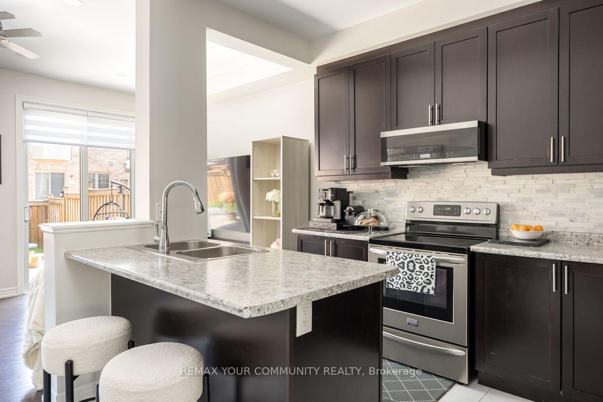 Photo 8 of 57 Davenfield Circle, Brampton, Bram East — HOMEH