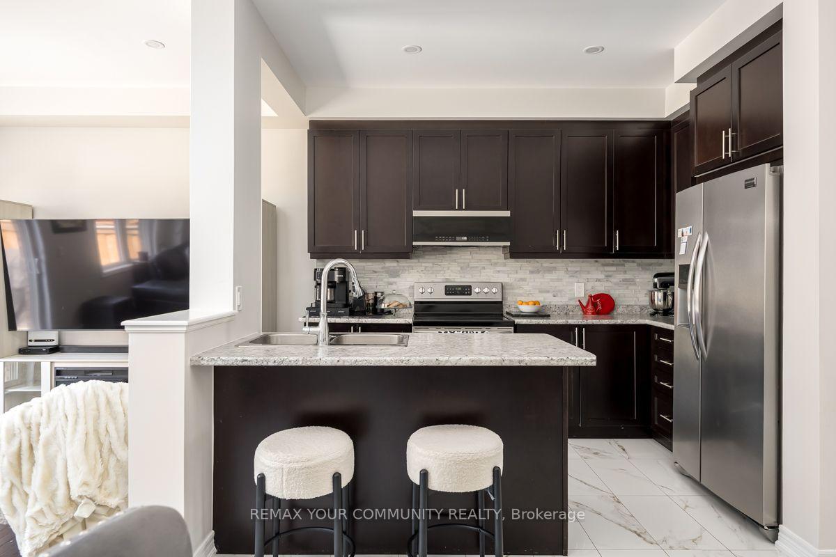 Photo 9 of 57 Davenfield Circle, Brampton, Bram East — HOMEH