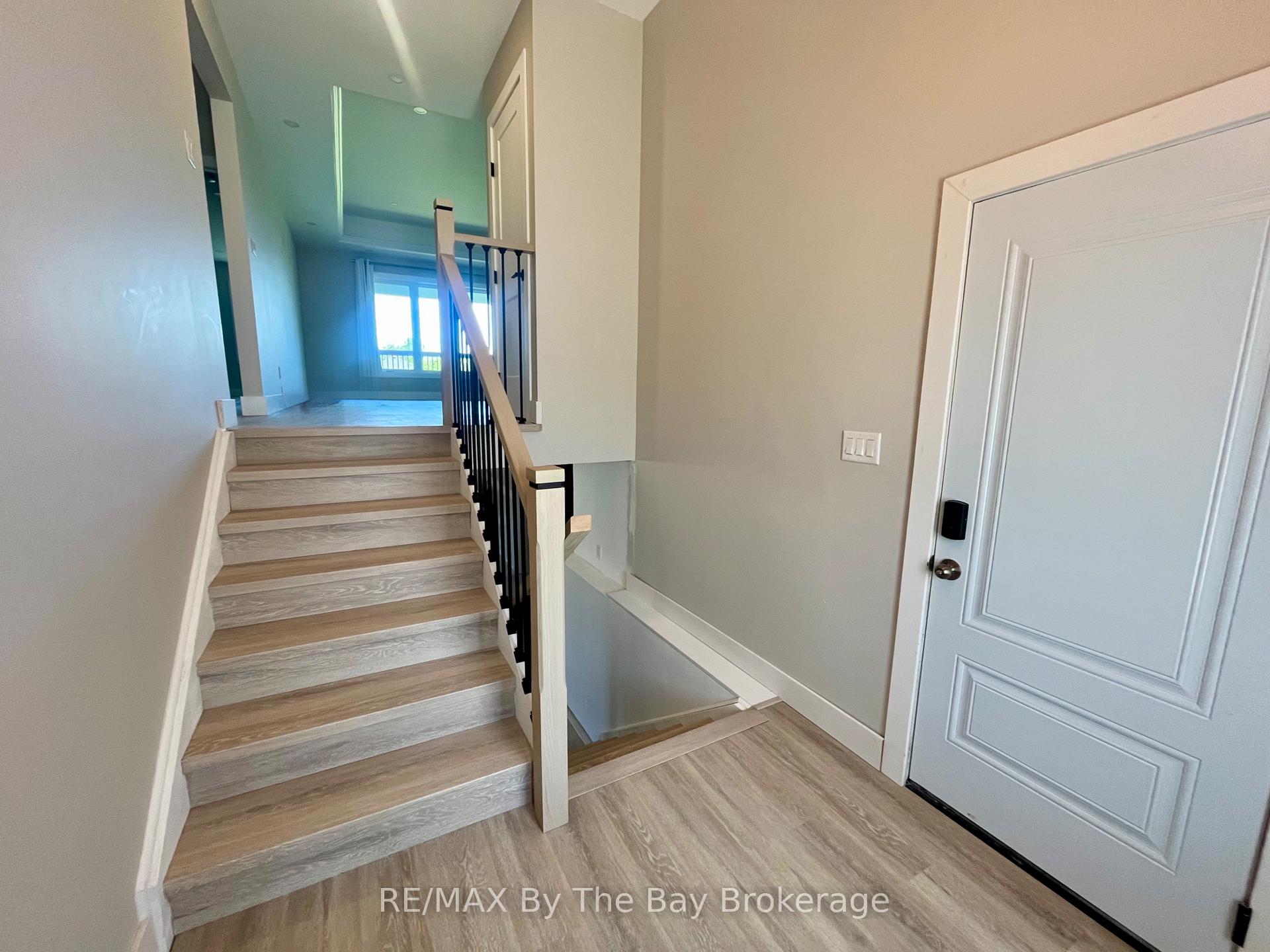 Photo 3 of 22 Lakeshore Road, Wasaga Beach — HOMEH