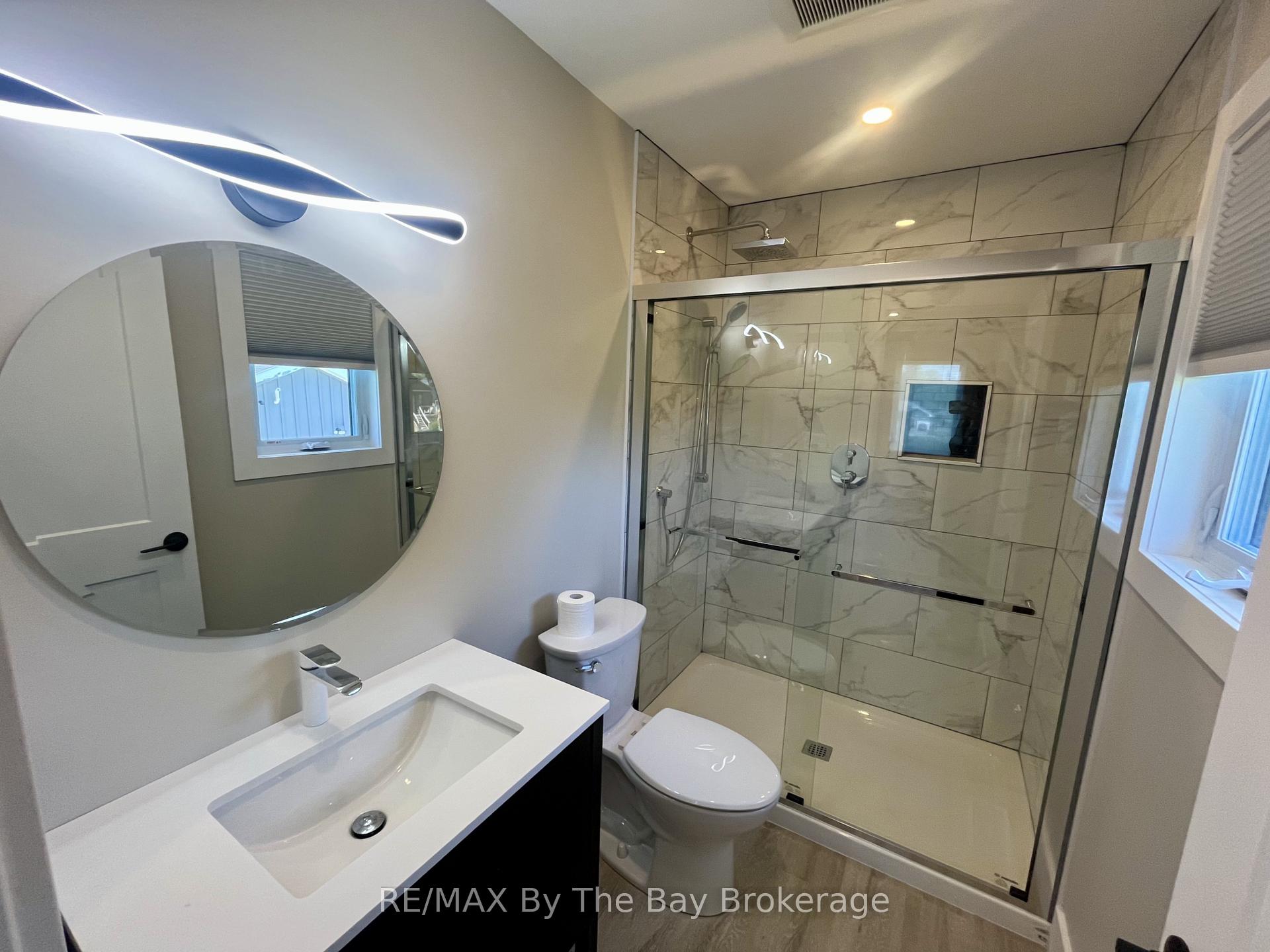 Photo 14 of 22 Lakeshore Road, Wasaga Beach — HOMEH
