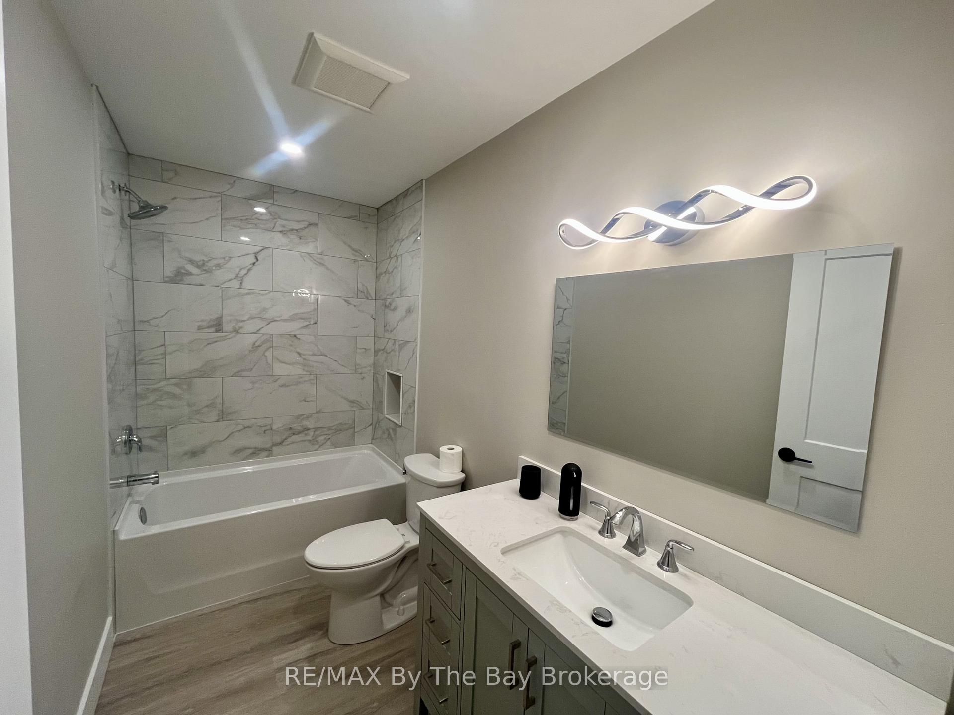 Photo 18 of 22 Lakeshore Road, Wasaga Beach — HOMEH