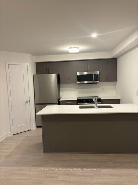 Photo 2 of 42 Lowes Road W, Guelph, Clairfields/Hanlon Business Park — HOMEH