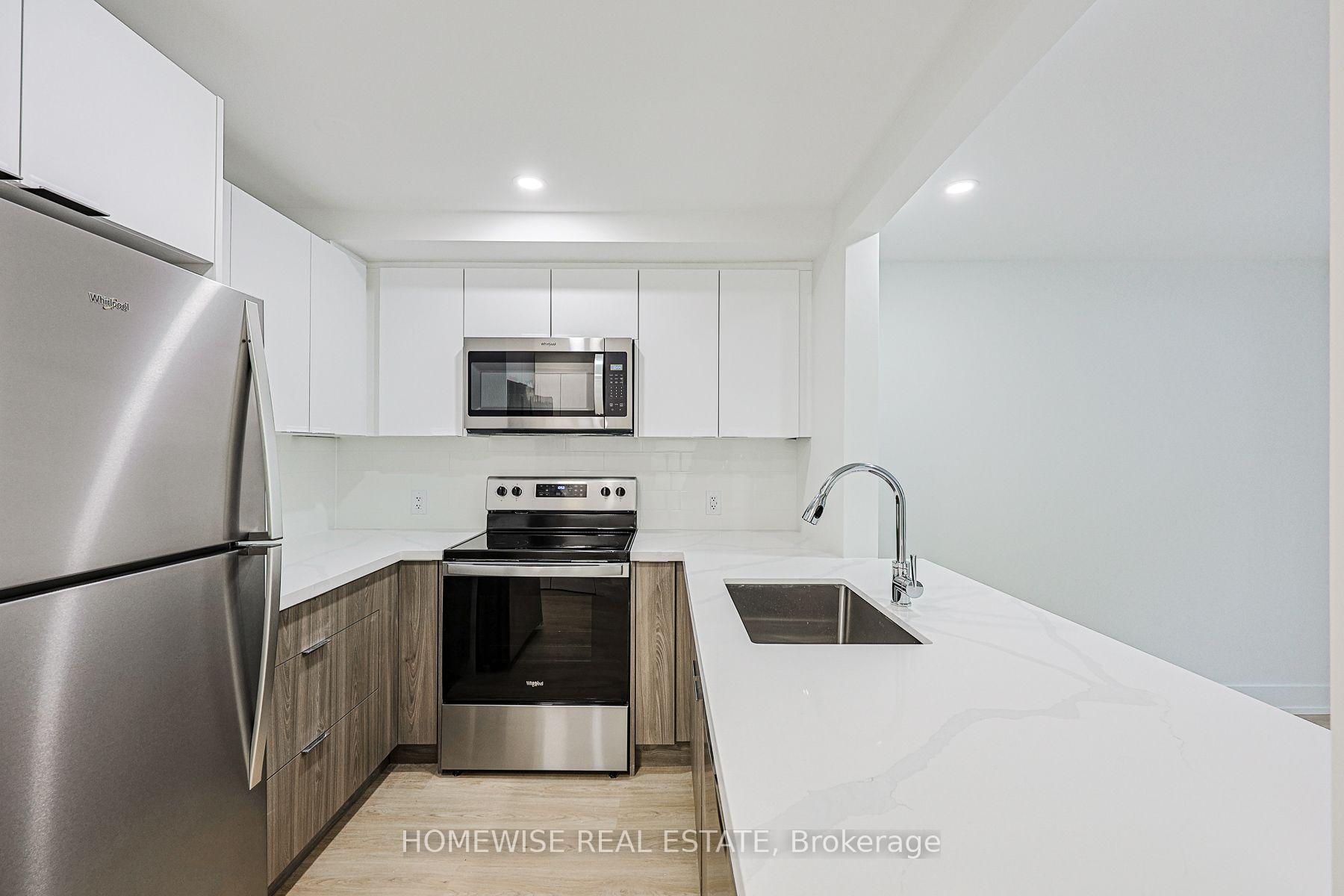 Photo 3 of Unit 8A, 100 Liberty Street N, Clarington, Bowmanville — HOMEH