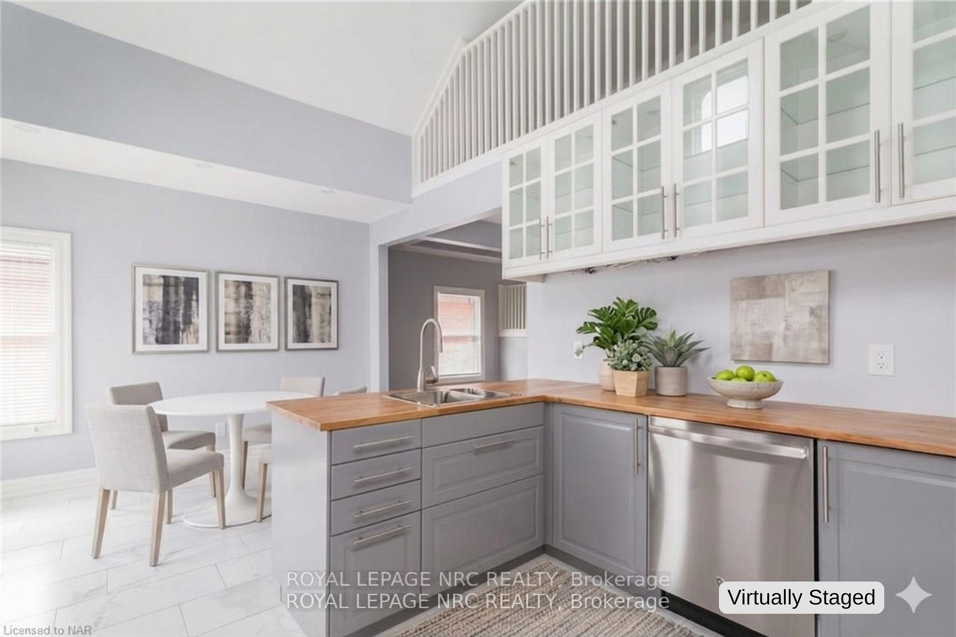 Photo 3 of Unit Upper, 6 Clark Street, St. Catharines, Downtown — HOMEH