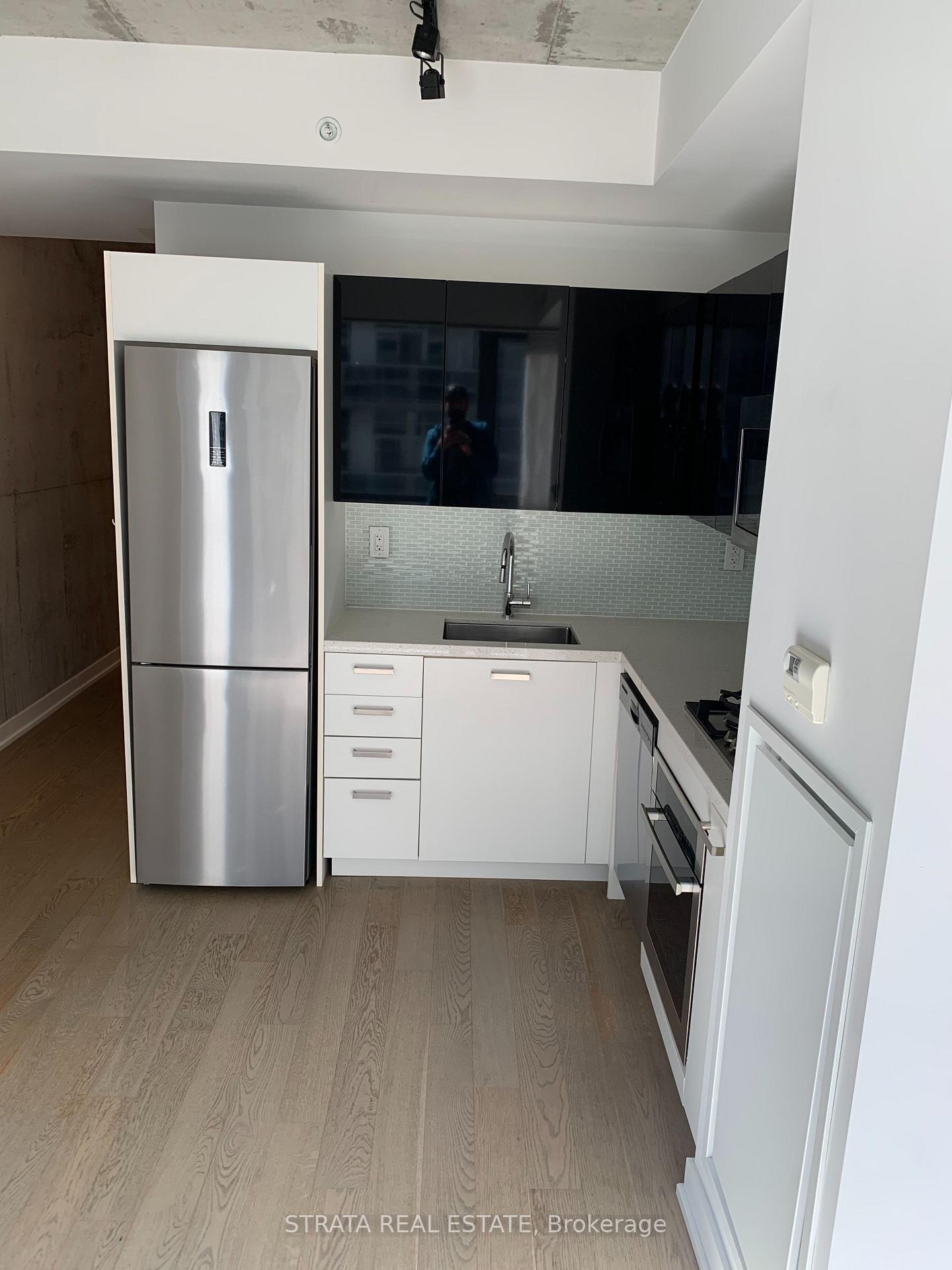 Photo 3 of Unit 411, 39 Brant Street, Toronto, Waterfront Communities — HOMEH
