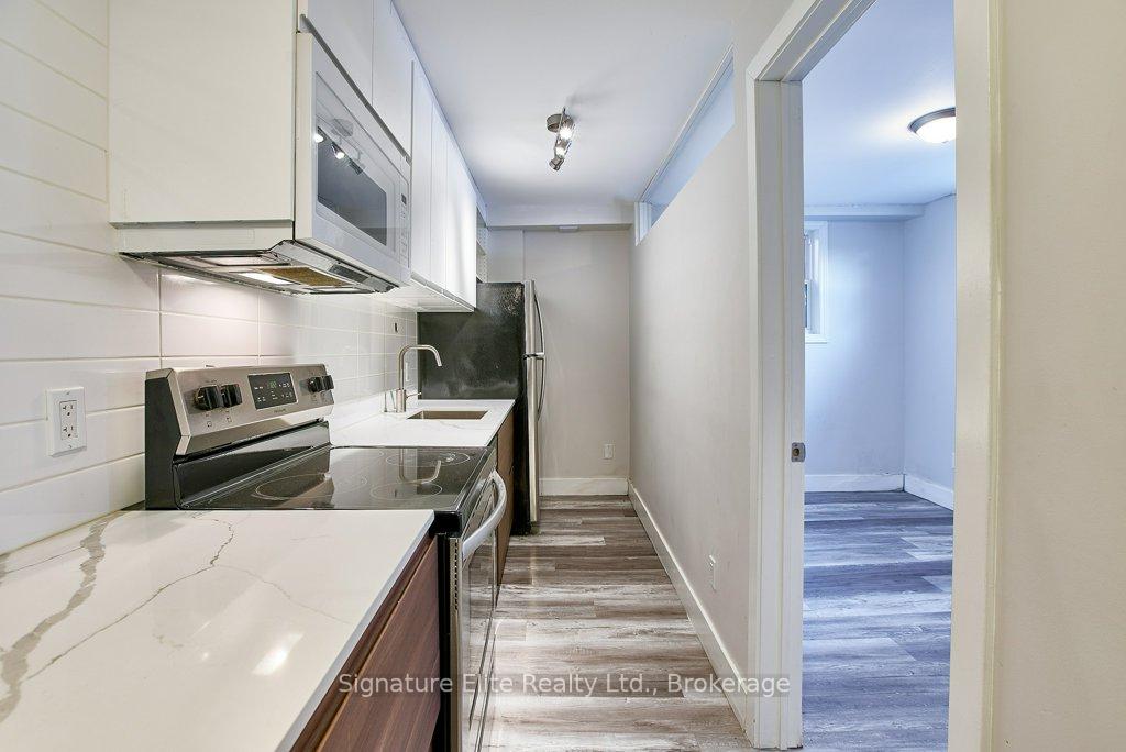 Photo 4 of Unit 102, 112 Alder Crescent, Etobicoke, Long Branch — HOMEH