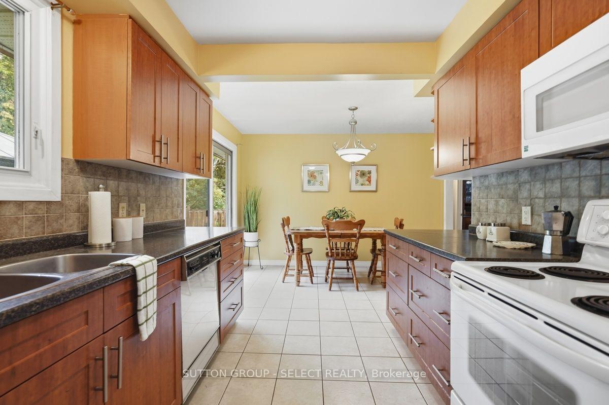 Photo 15 of 643 Widmore Drive, London, South O — HOMEH