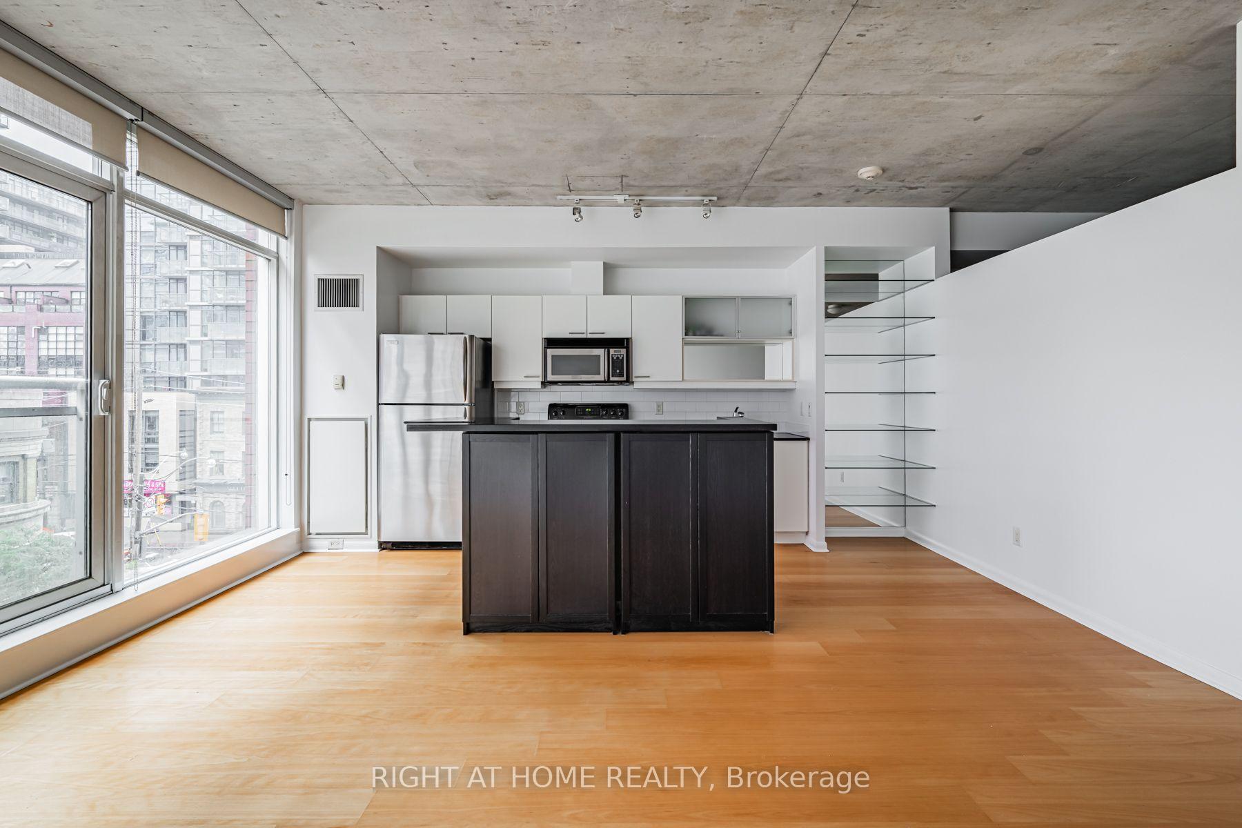 Photo 5 of Unit 418, 333 Adelaide Street E, Toronto, Moss Park — HOMEH
