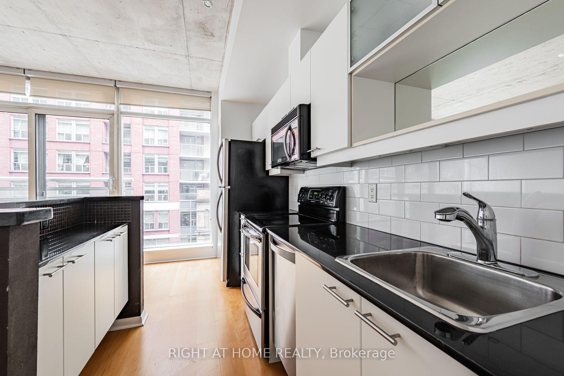 Photo 11 of Unit 418, 333 Adelaide Street E, Toronto, Moss Park — HOMEH