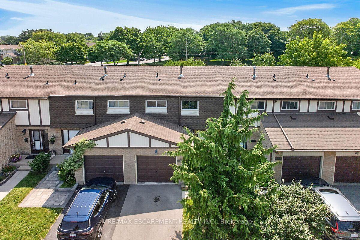 Photo 2 of Unit 24, 300 Rexford Drive, Hamilton, Randall — HOMEH