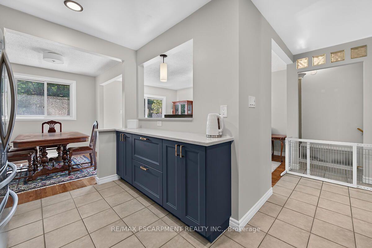 Photo 14 of Unit 24, 300 Rexford Drive, Hamilton, Randall — HOMEH