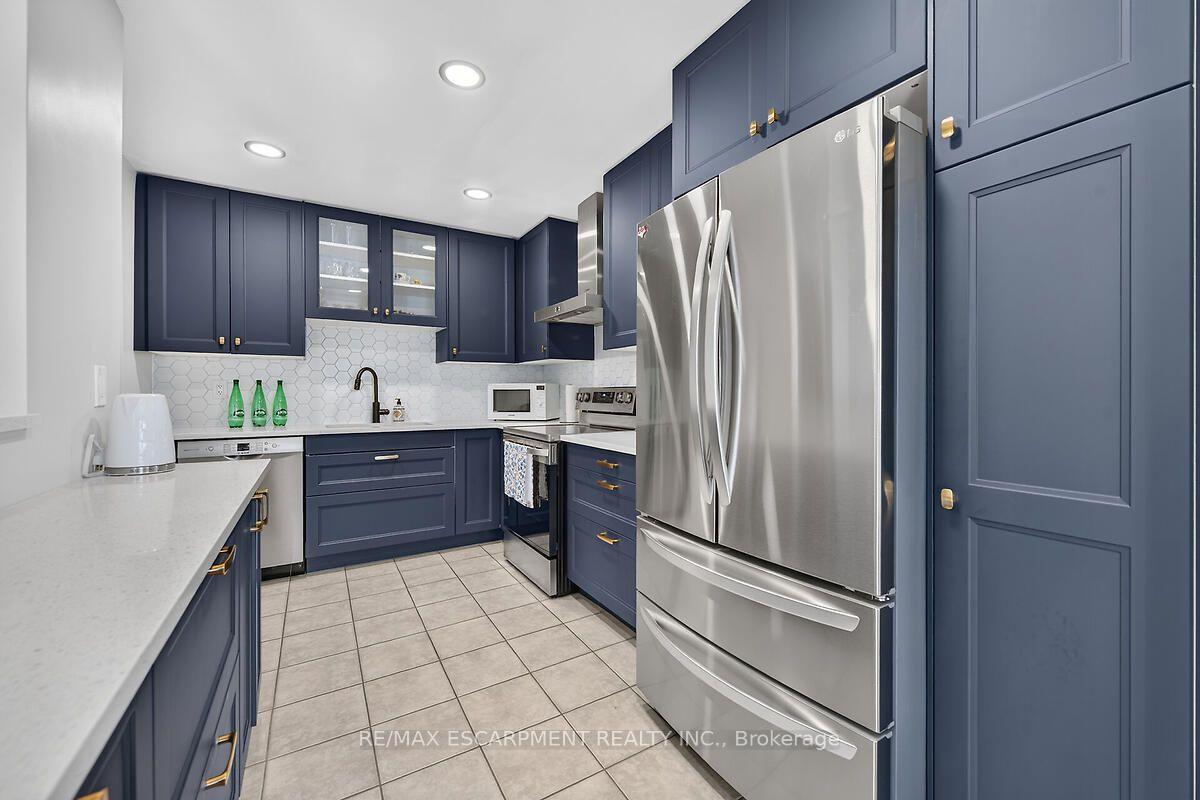 Photo 16 of Unit 24, 300 Rexford Drive, Hamilton, Randall — HOMEH