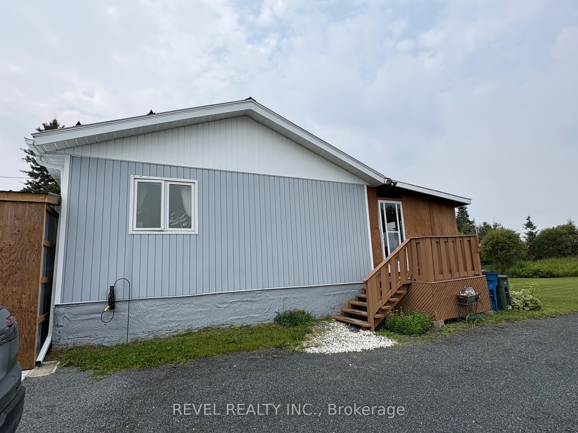 Photo 4 of 253 Highway 11 S, Cochrane — HOMEH